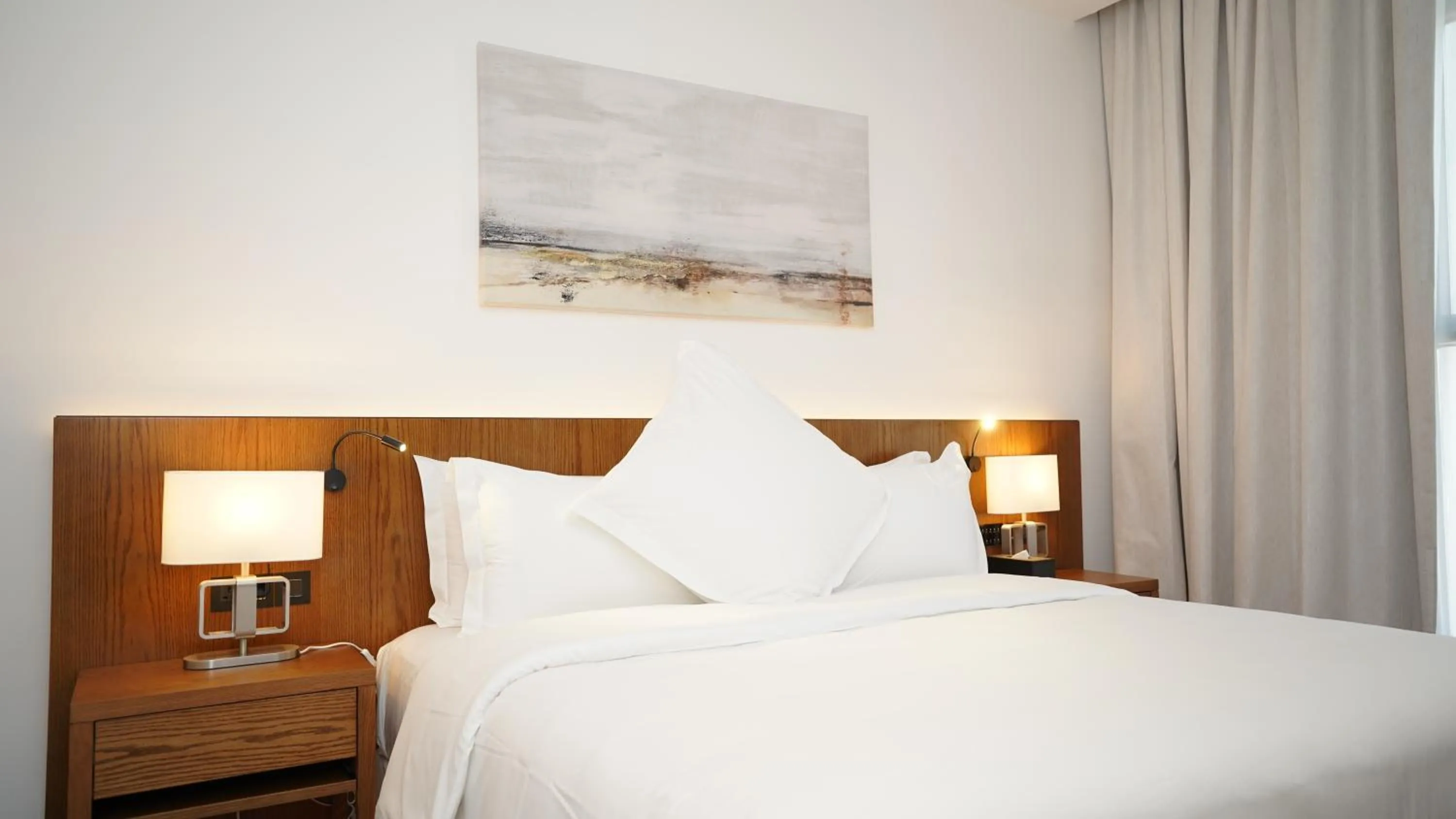 Bed in Jasmine Garden Hotel