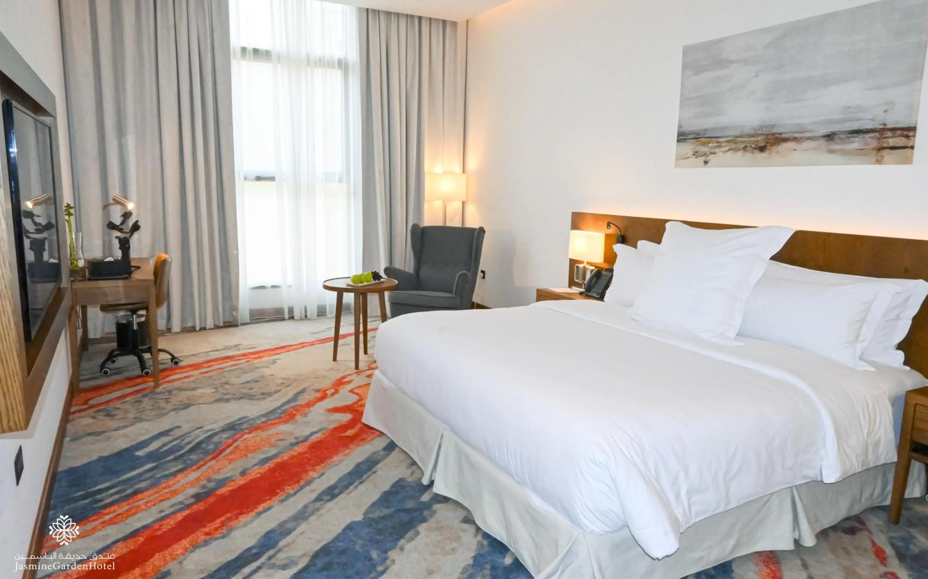 Bed in Jasmine Garden Hotel