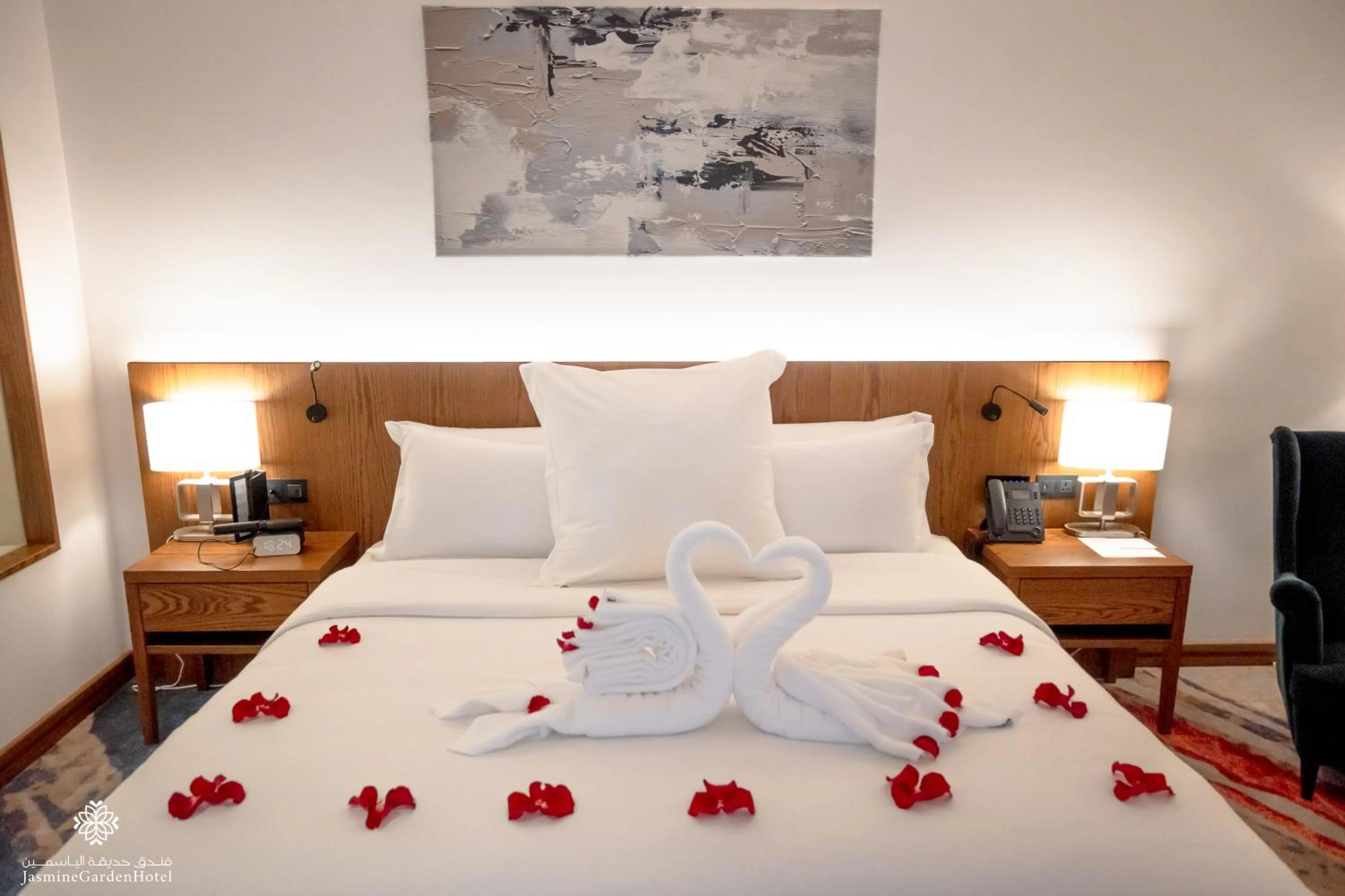 Bed in Jasmine Garden Hotel