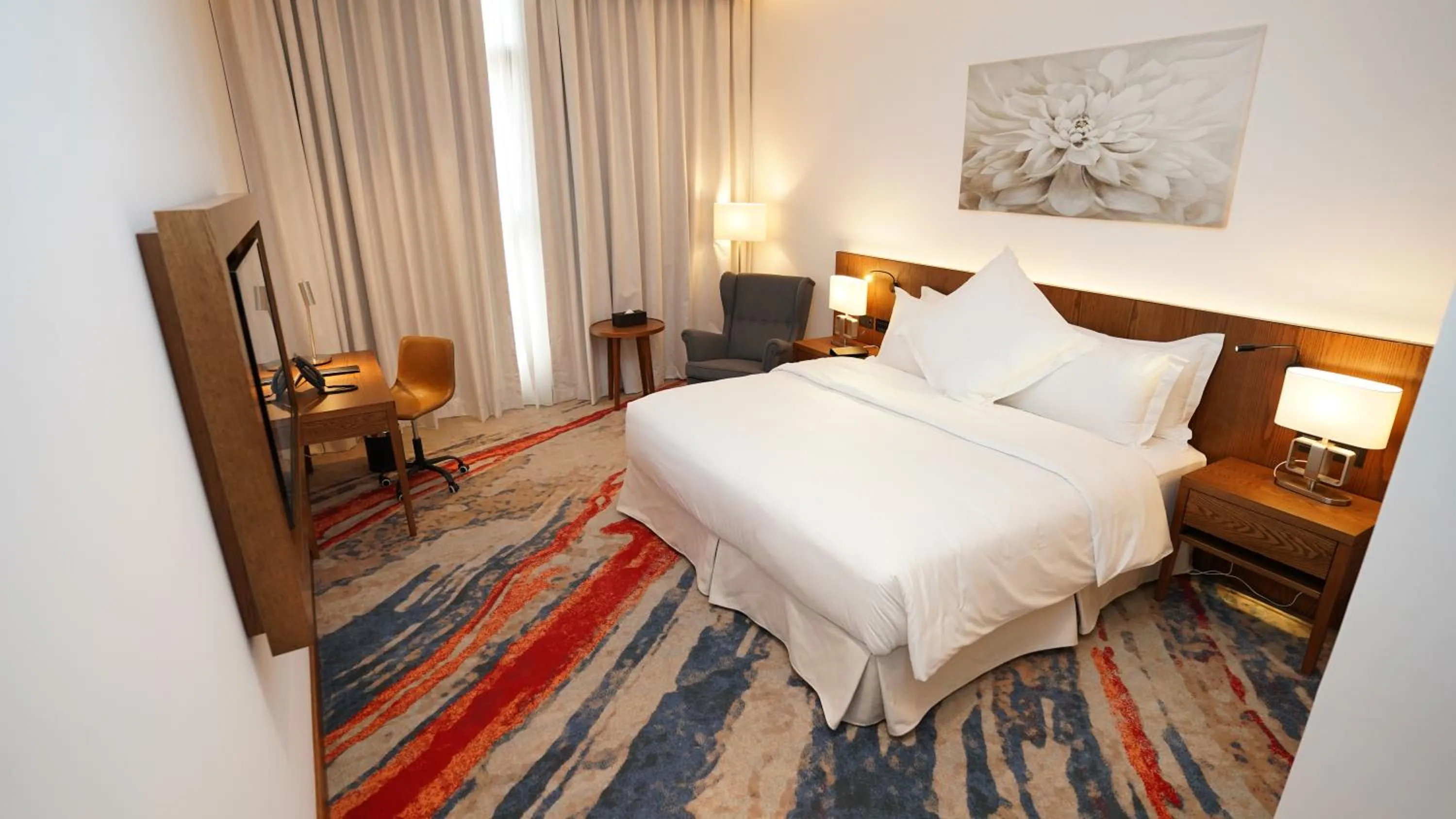 Bed in Jasmine Garden Hotel