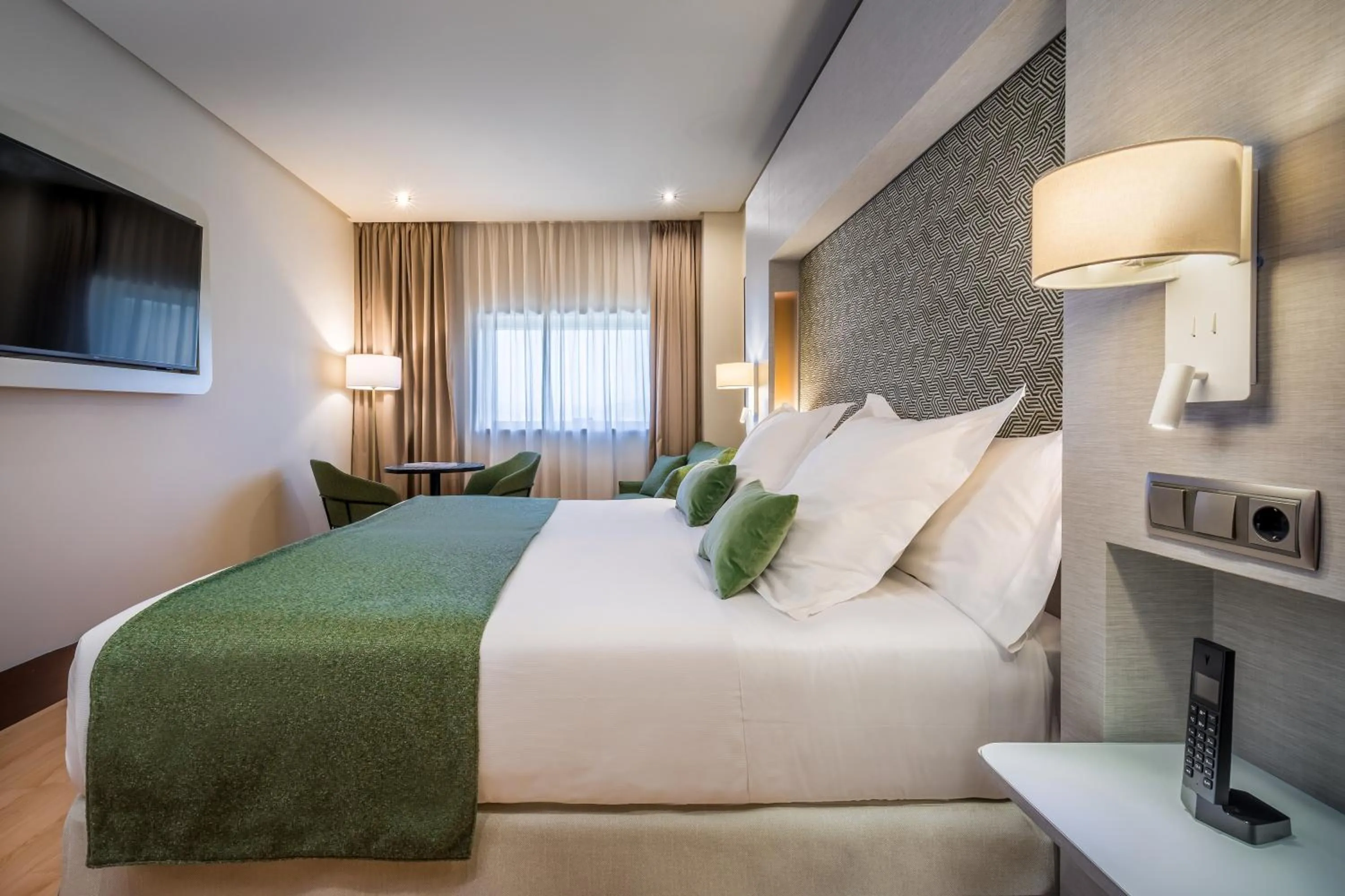 Bed in Barceló Granada Congress