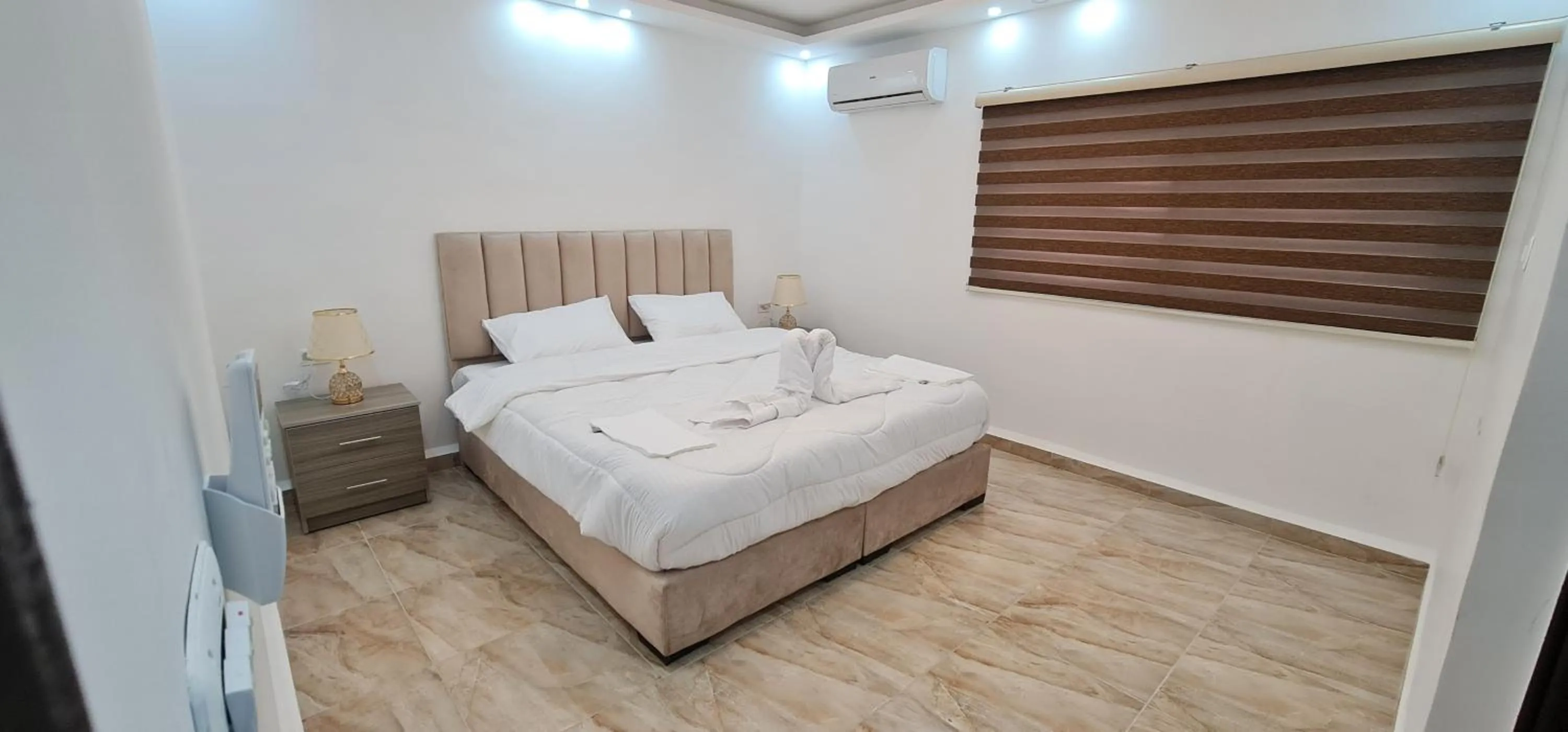 Bed in Nabateans Home Hotel