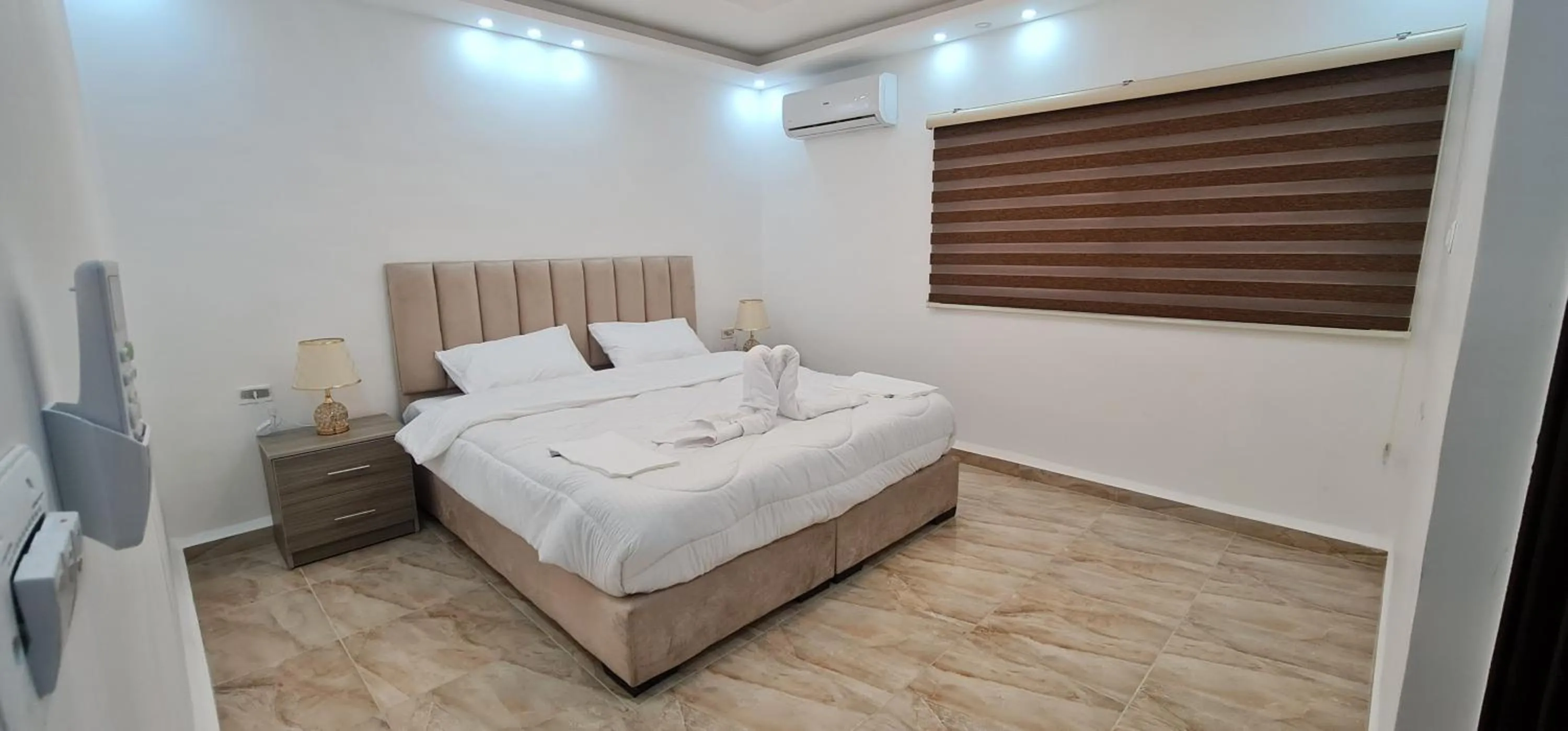 Bed in Nabateans Home Hotel