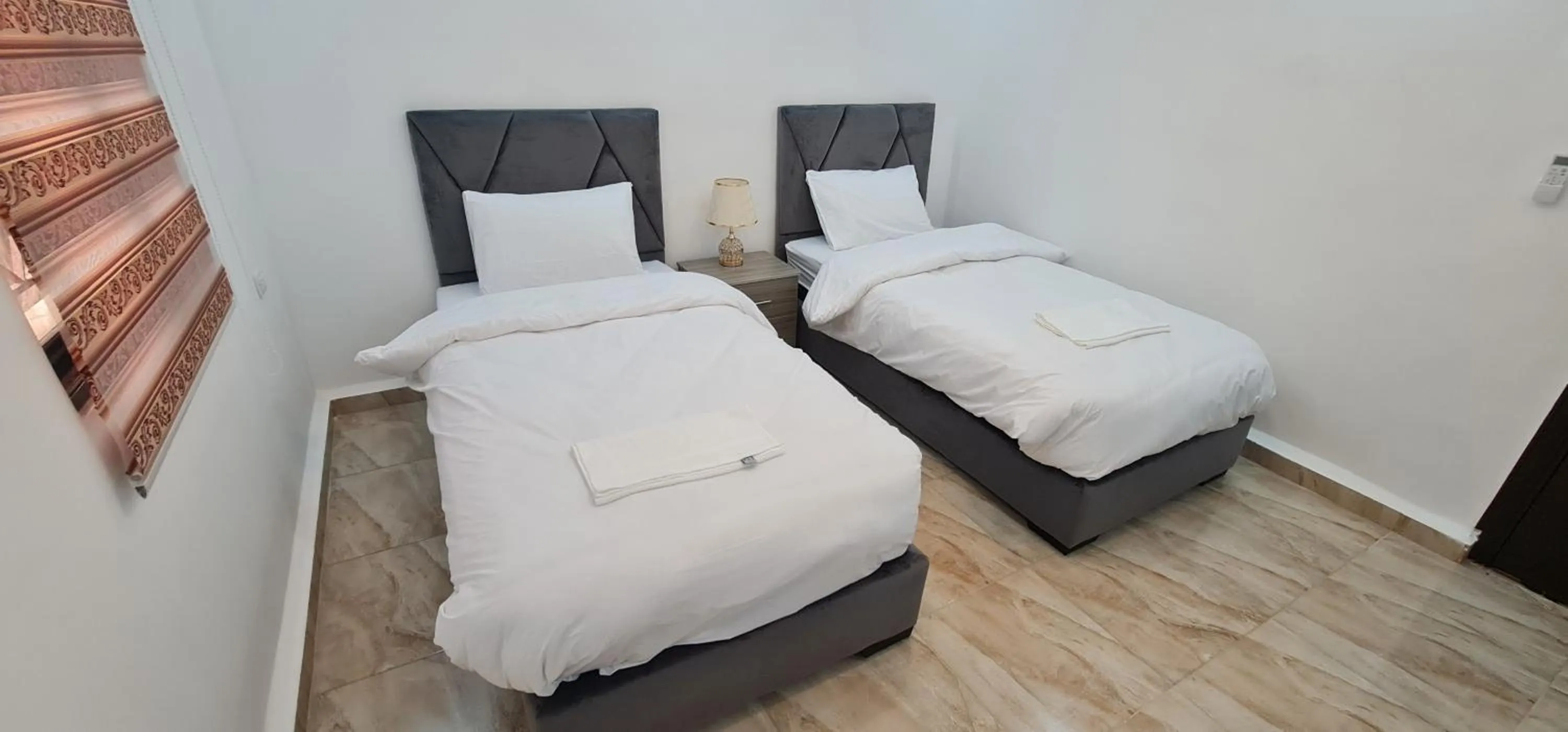 Bed in Nabateans Home Hotel