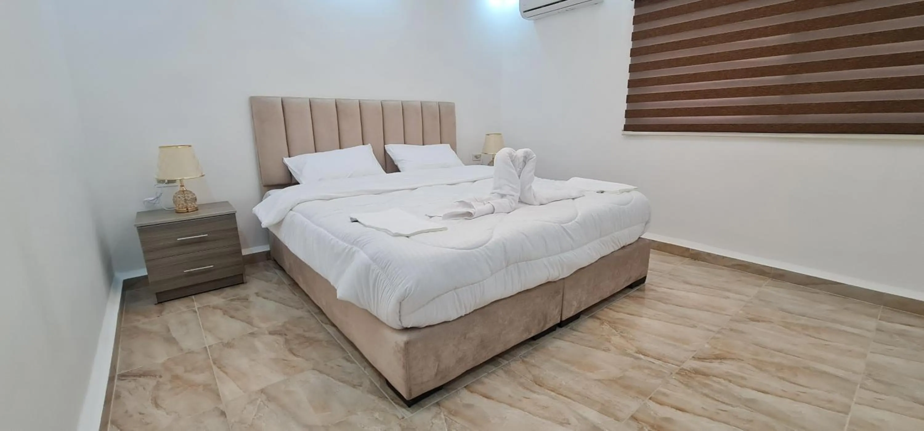 Bed in Nabateans Home Hotel