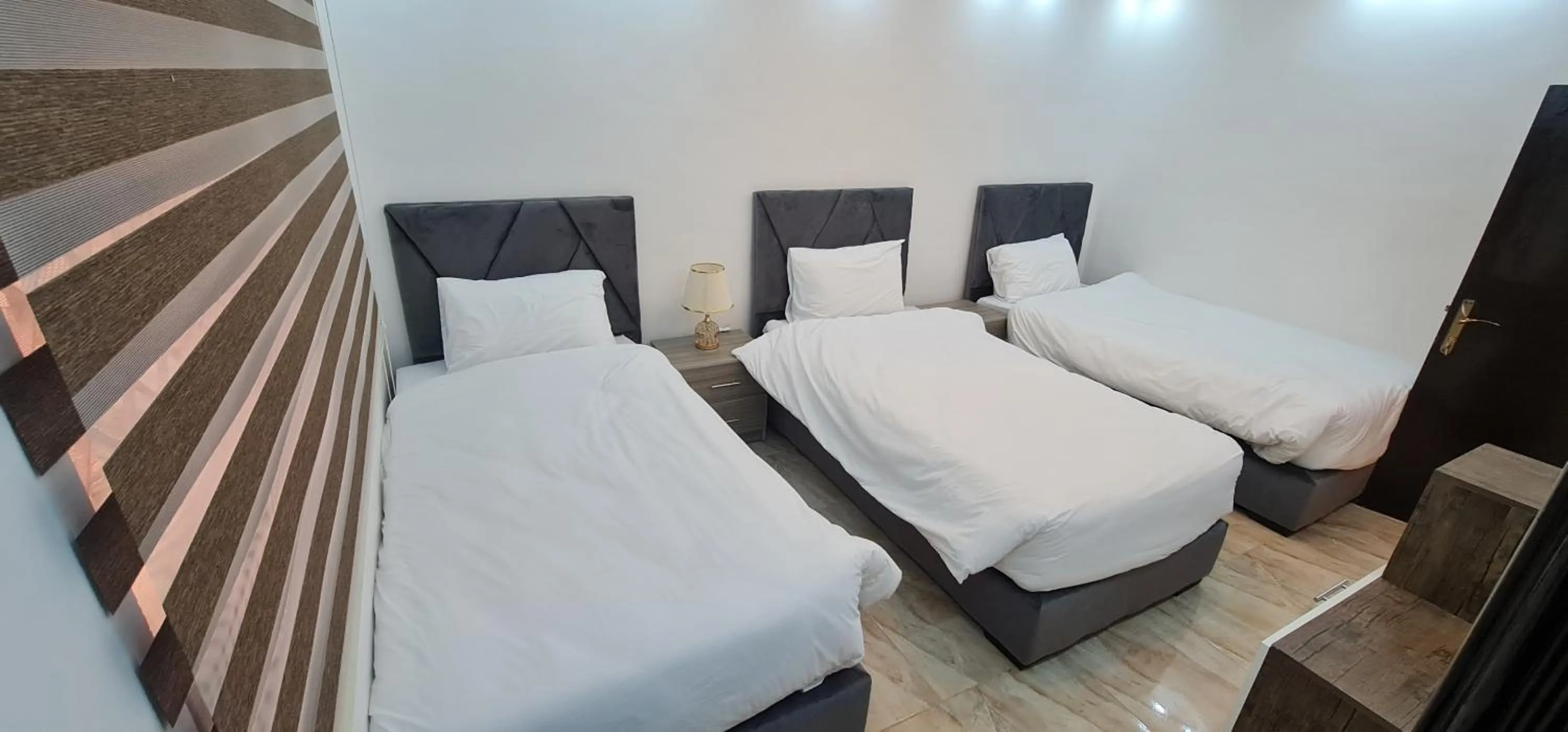 Bed in Nabateans Home Hotel