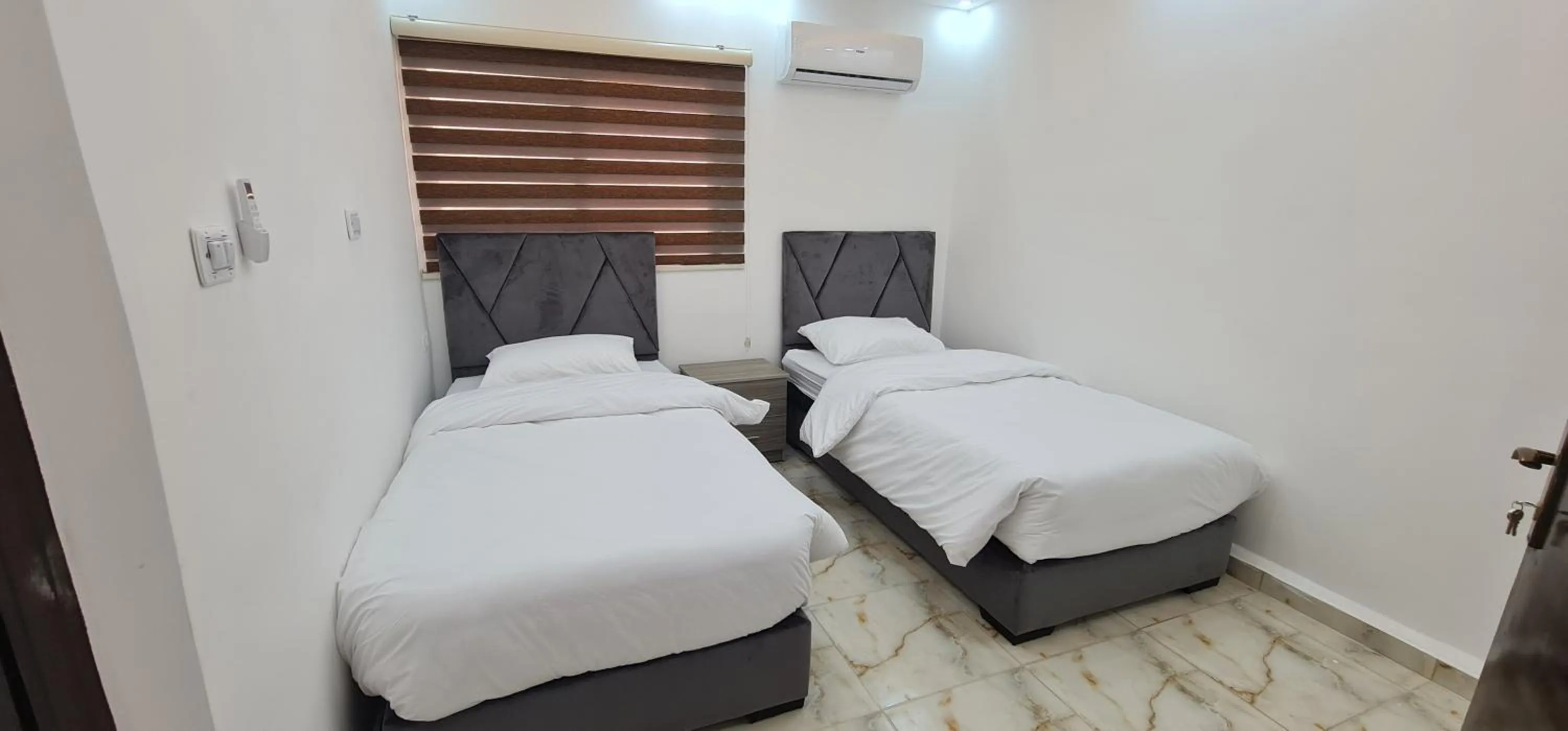 Bed in Nabateans Home Hotel