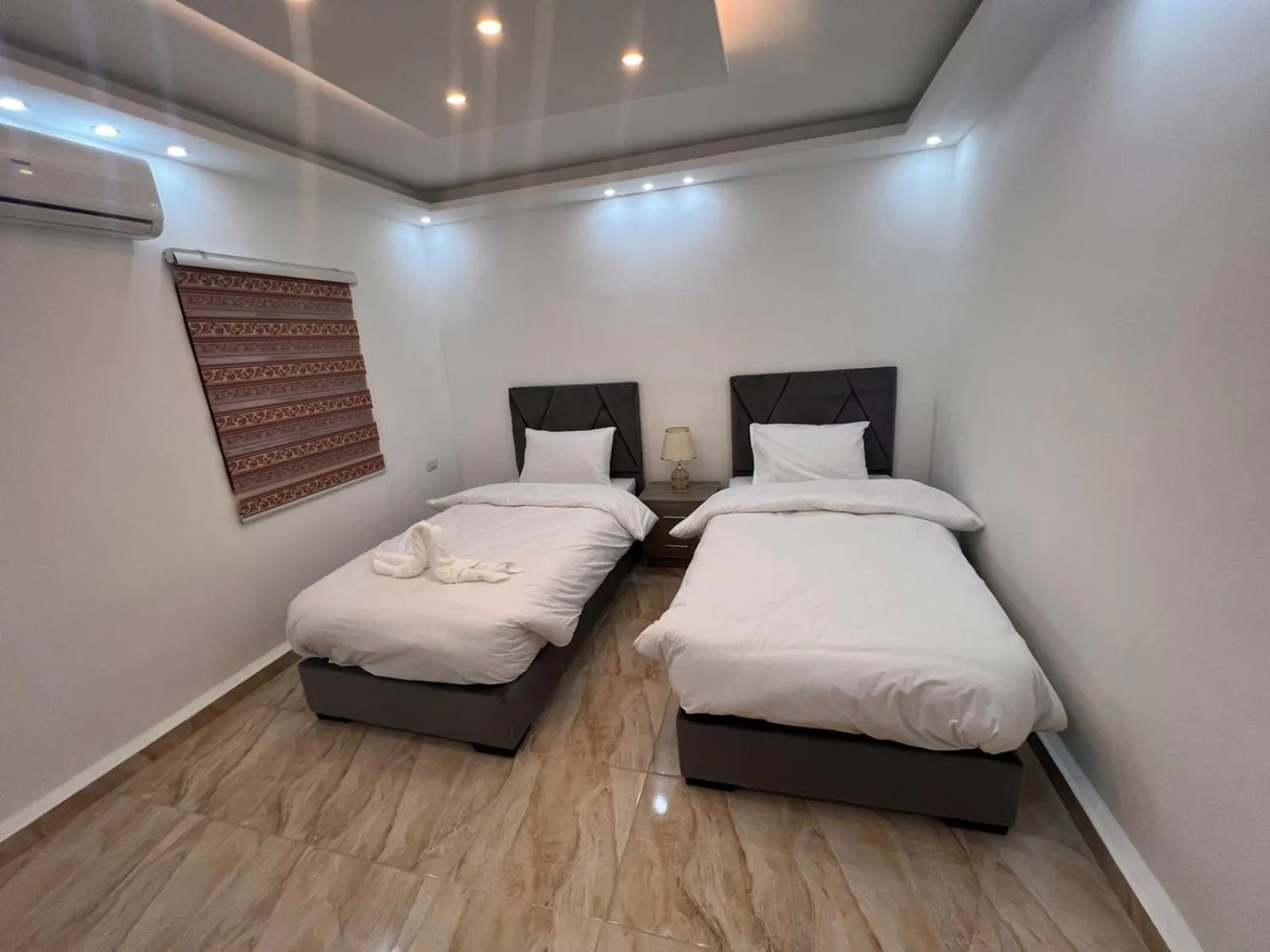 Bed in Nabateans Home Hotel