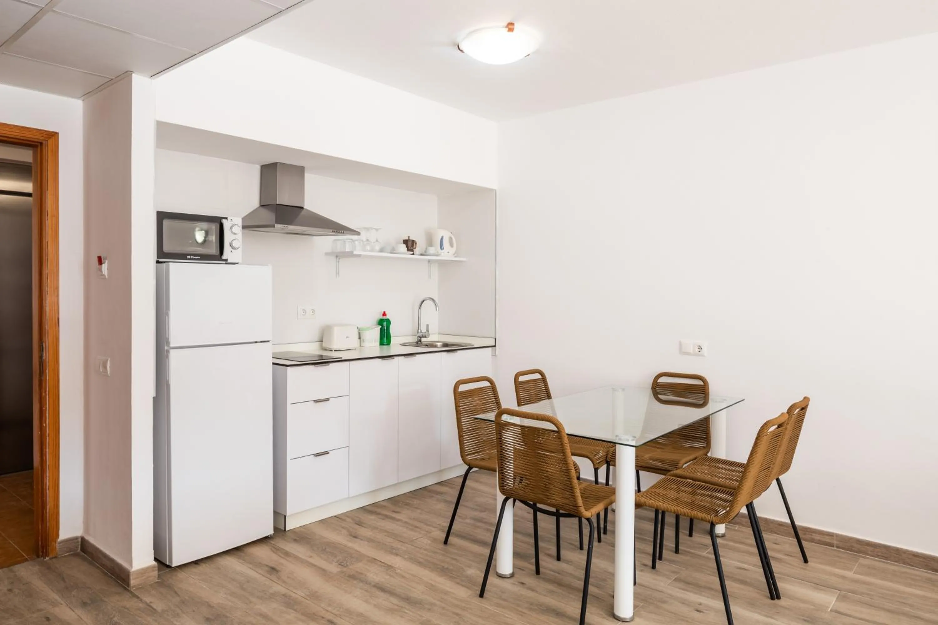 Kitchen or kitchenette in Aparthotel Puerto Cala Vadella