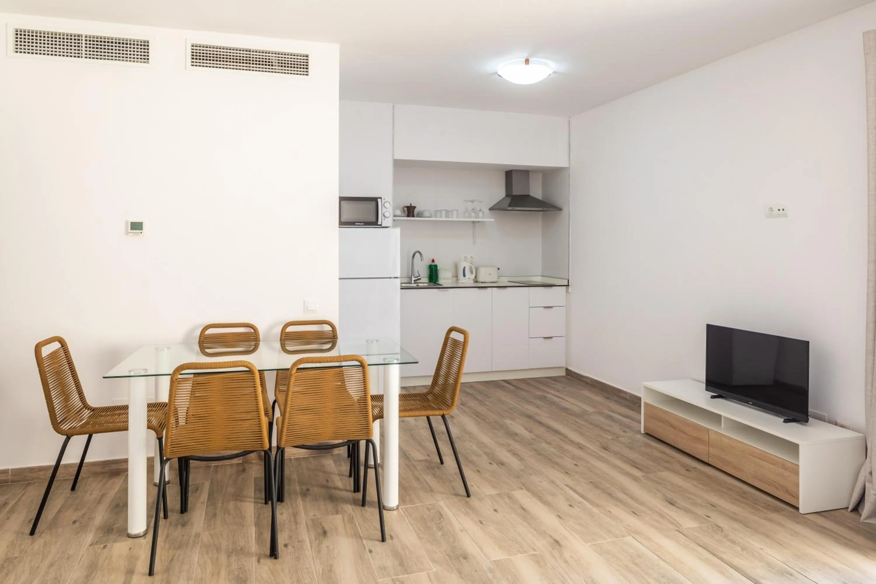 Kitchen or kitchenette in Aparthotel Puerto Cala Vadella