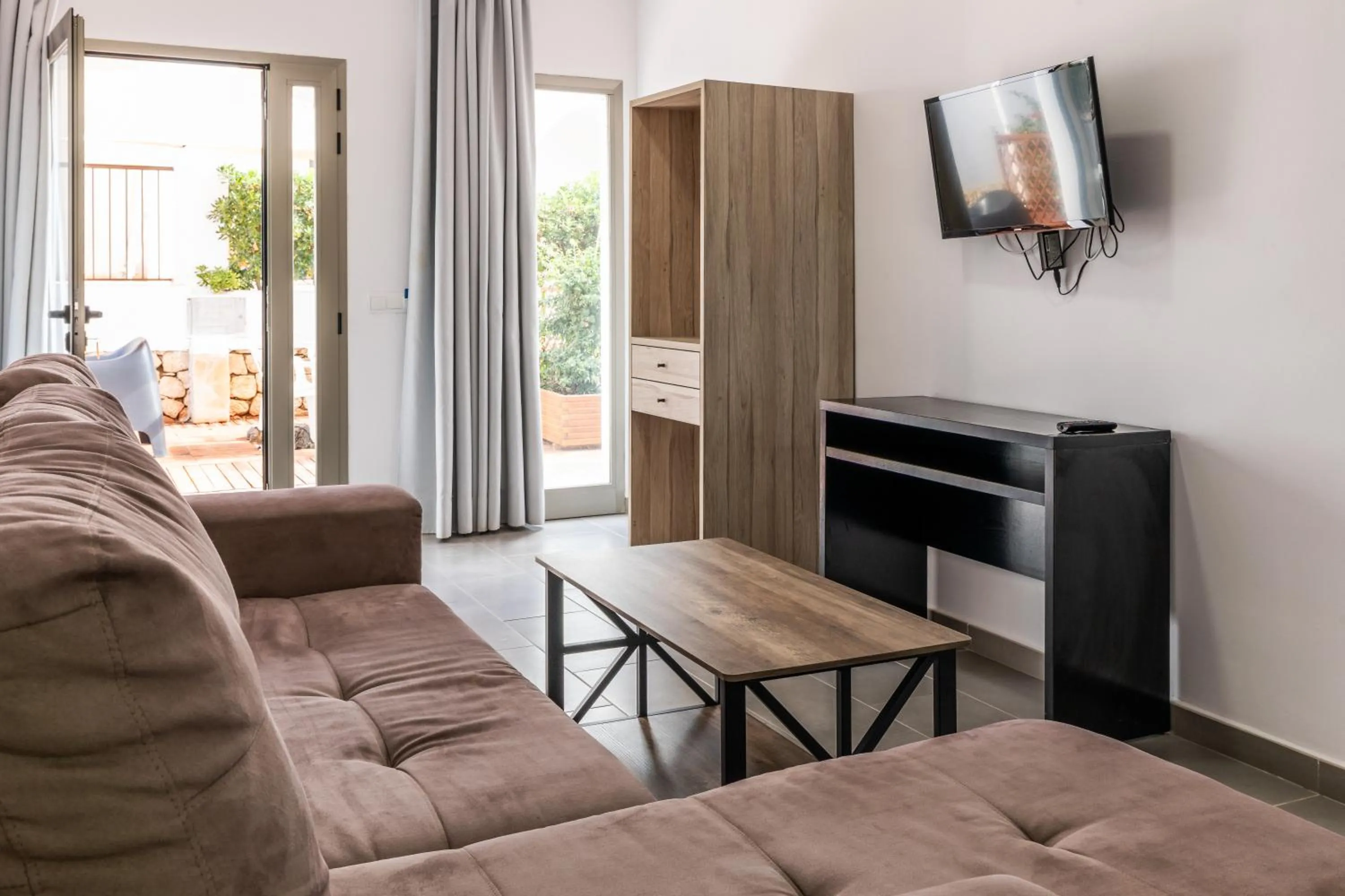 Living room in Aparthotel Puerto Cala Vadella