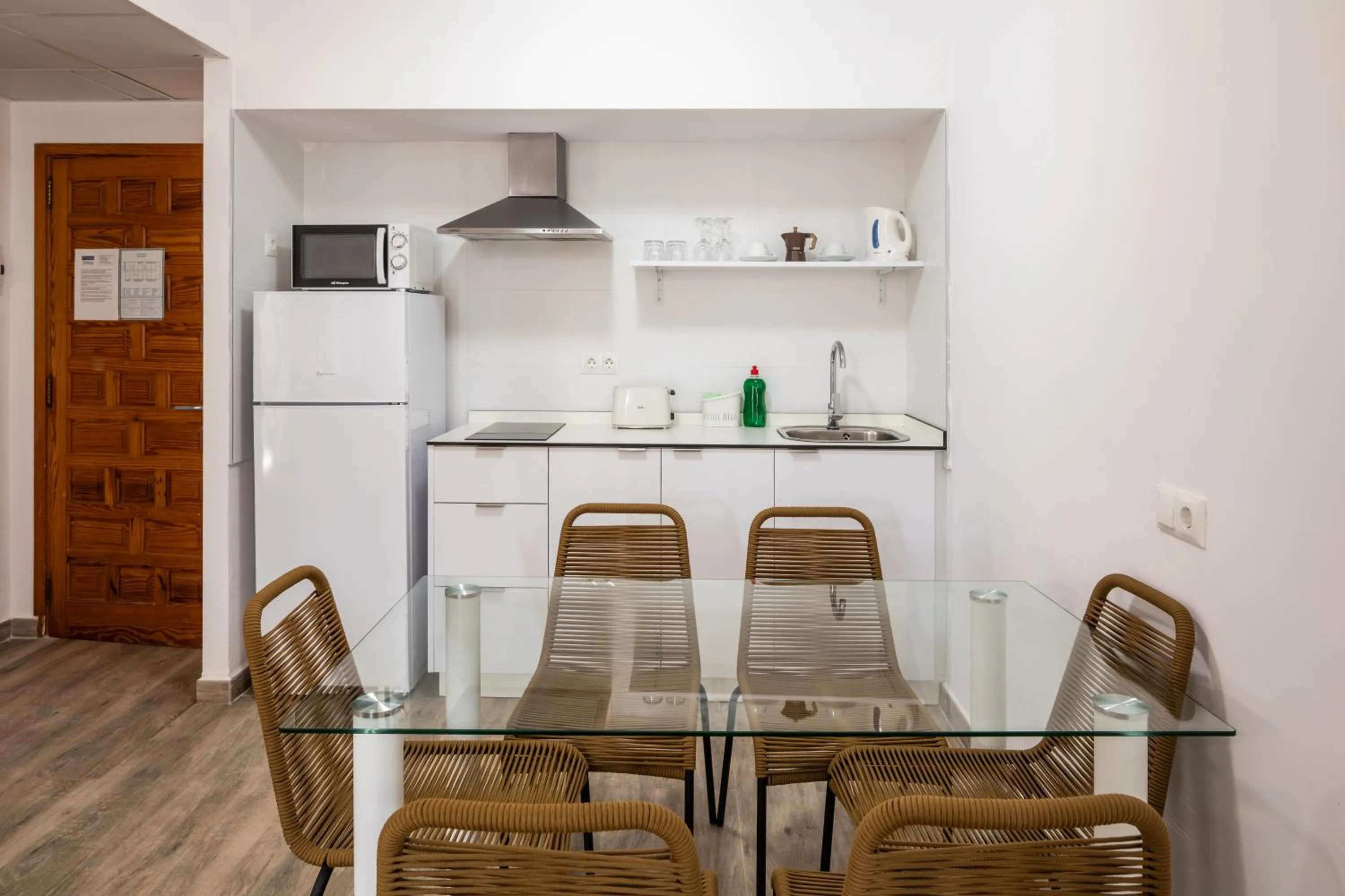 Kitchen or kitchenette in Aparthotel Puerto Cala Vadella