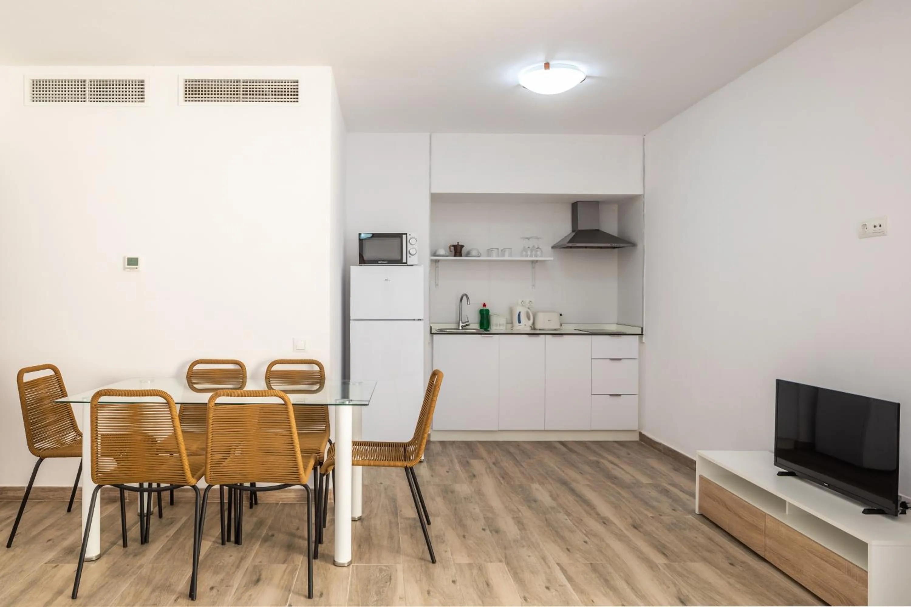 Kitchen or kitchenette in Aparthotel Puerto Cala Vadella