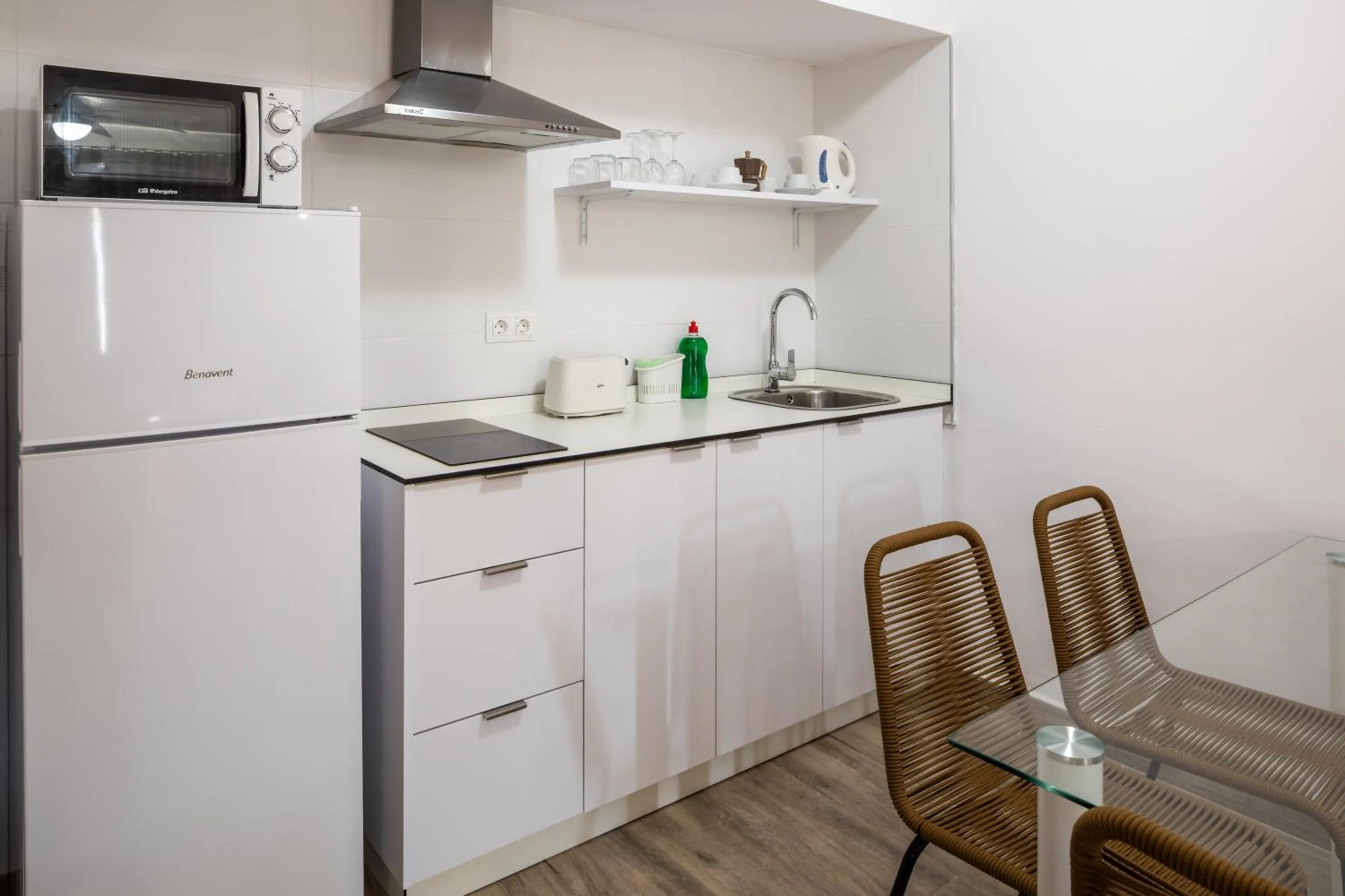 Kitchen or kitchenette in Aparthotel Puerto Cala Vadella