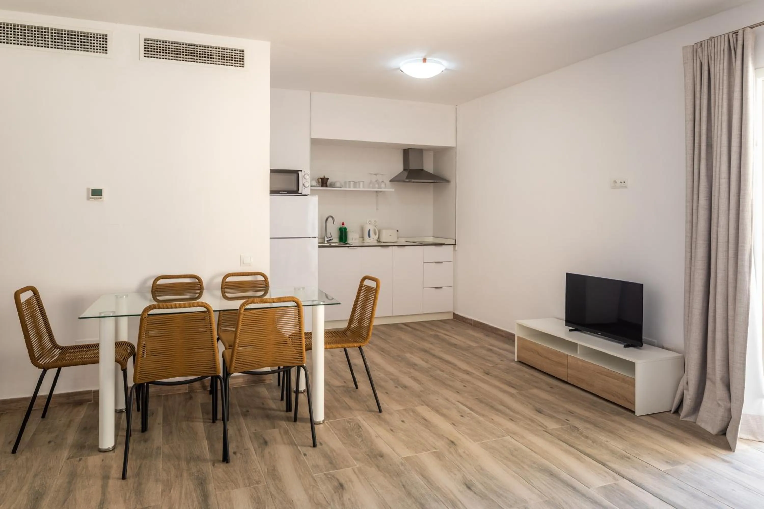 Kitchen or kitchenette in Aparthotel Puerto Cala Vadella