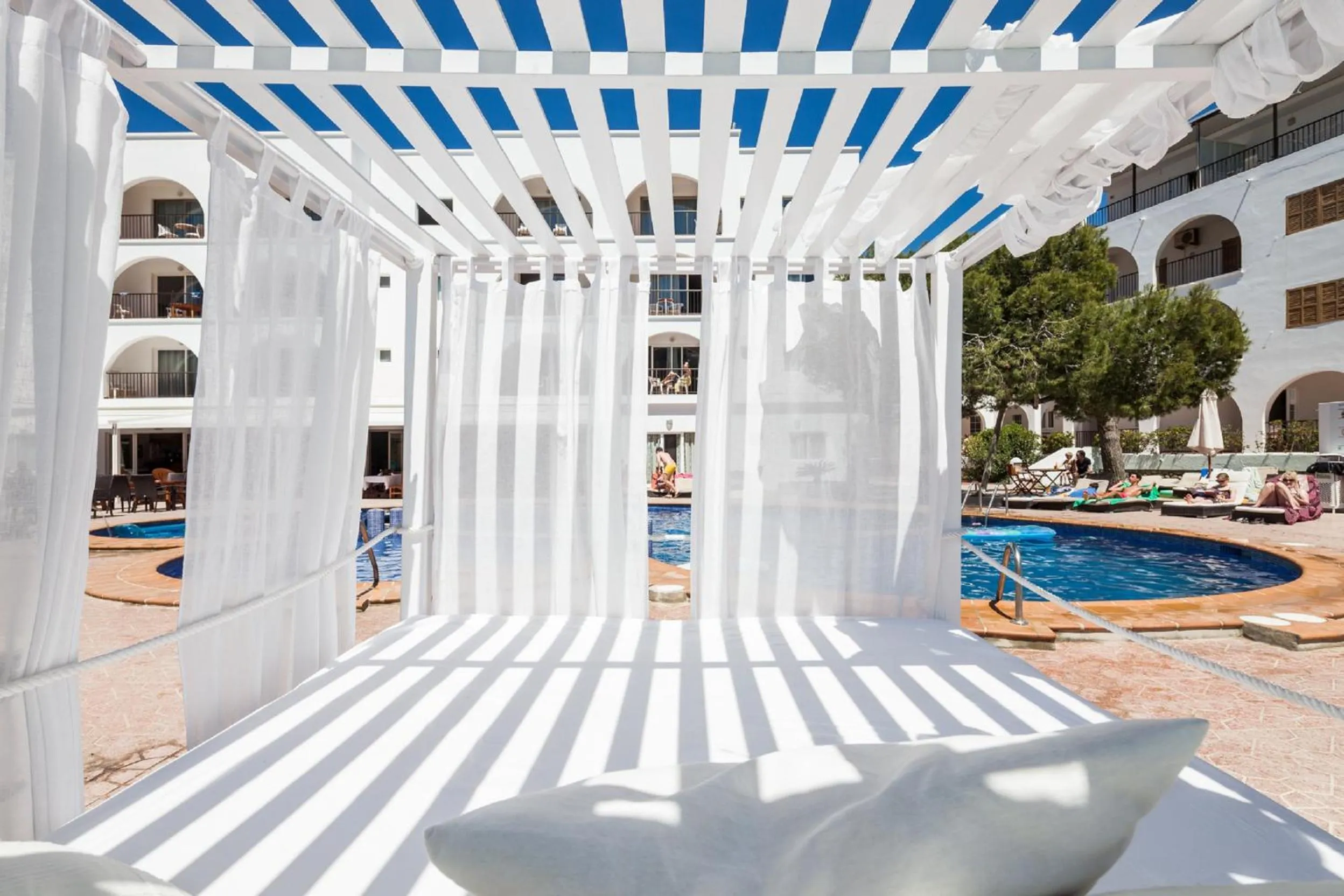 Swimming pool in Aparthotel Puerto Cala Vadella