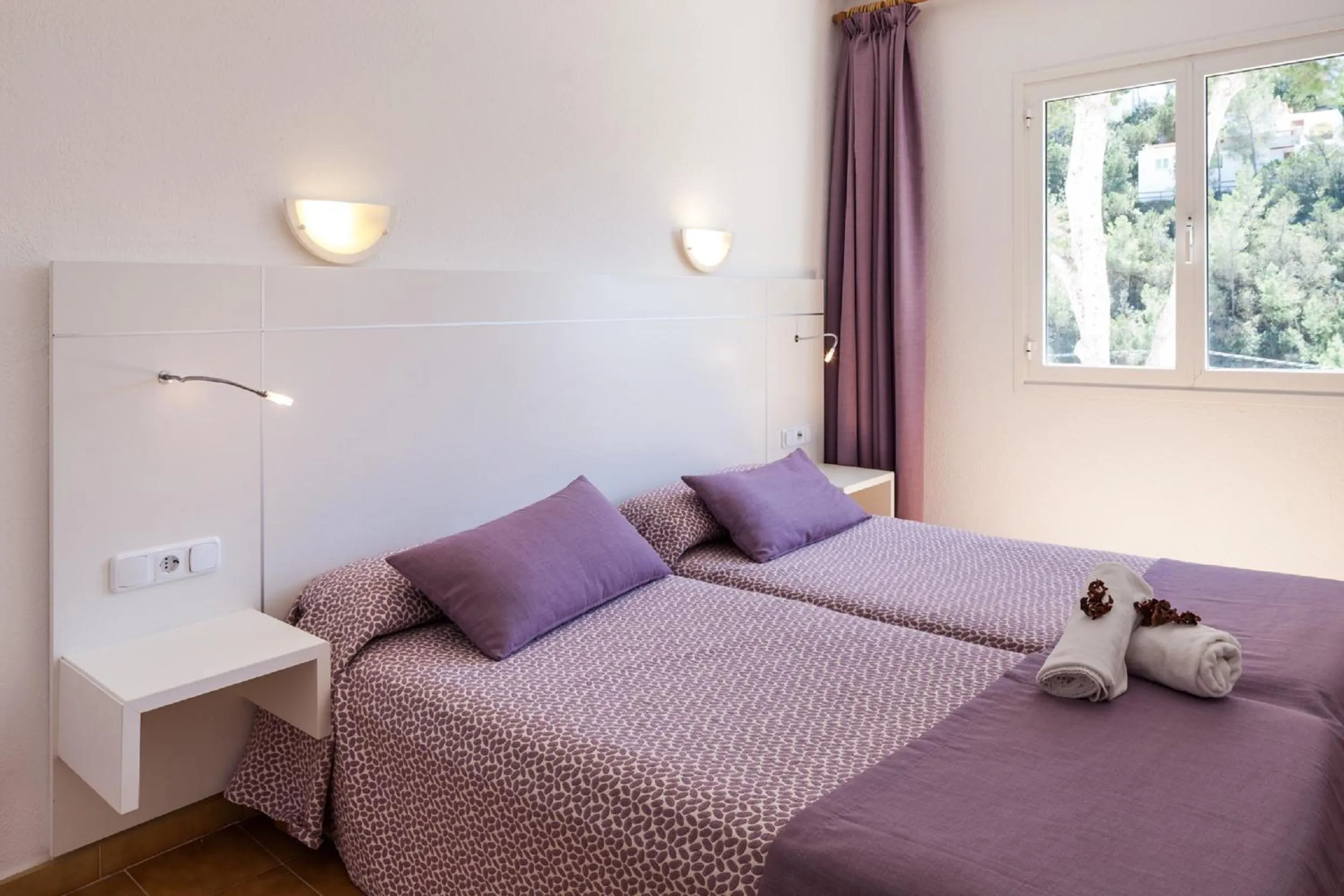 Bed in Aparthotel Puerto Cala Vadella