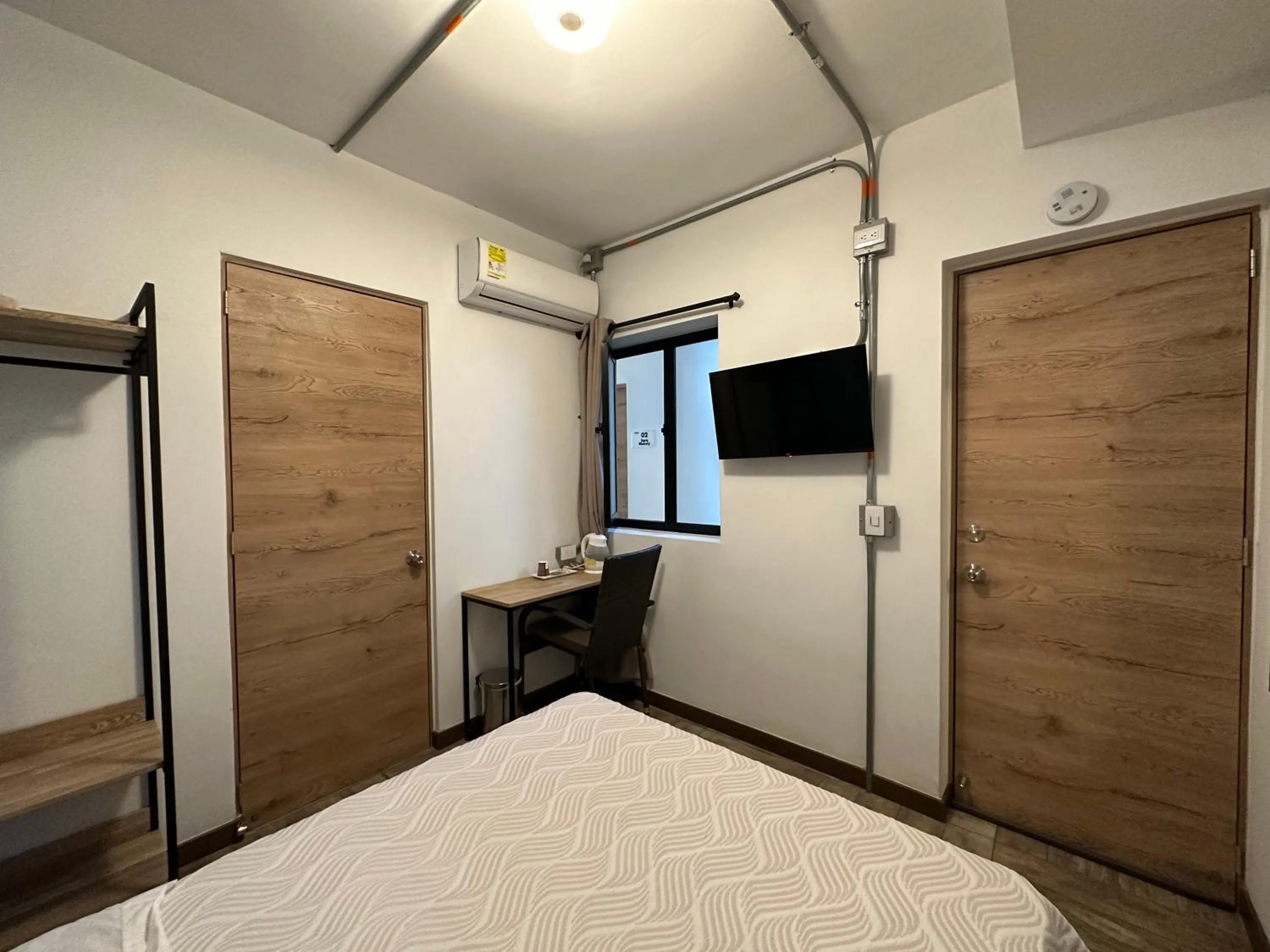 Bed in CoLinkHouse Hotel