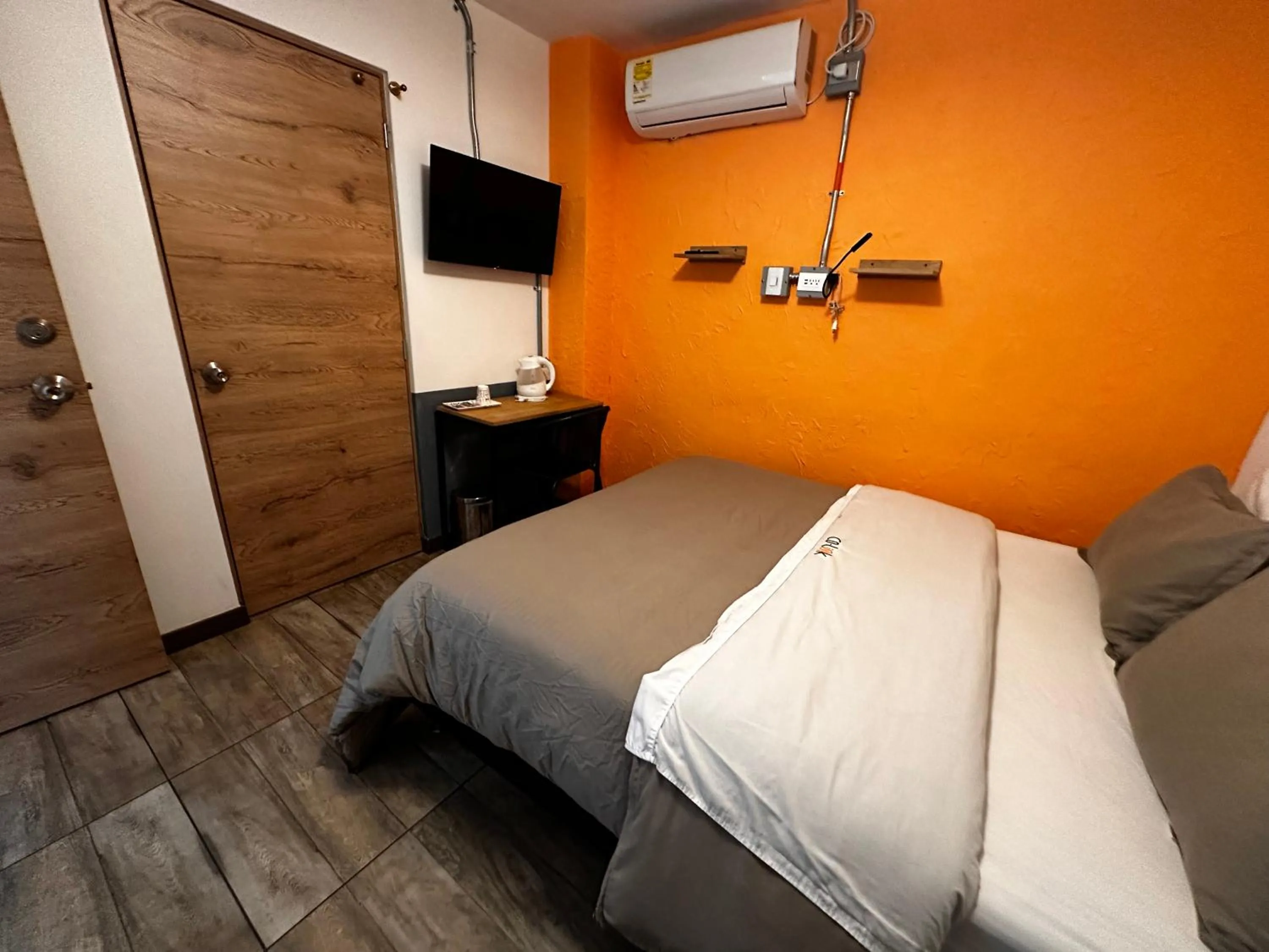 Bed in CoLinkHouse Hotel