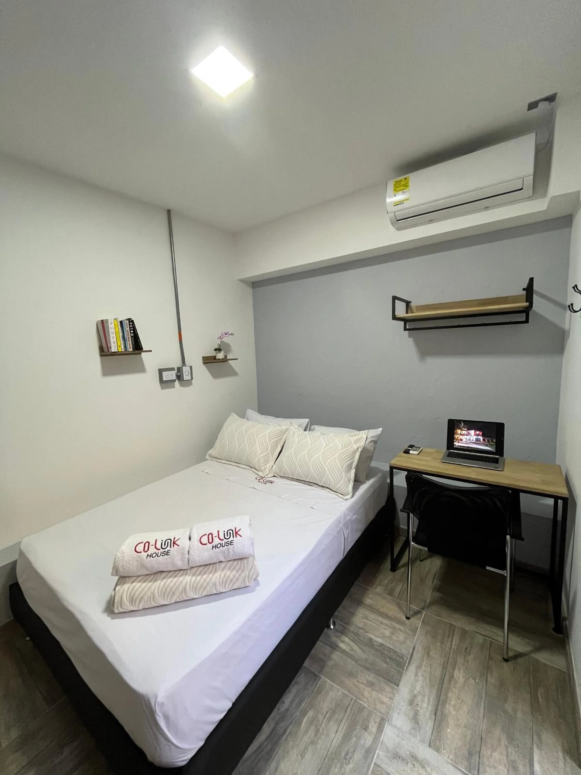 Bed in CoLinkHouse Hotel