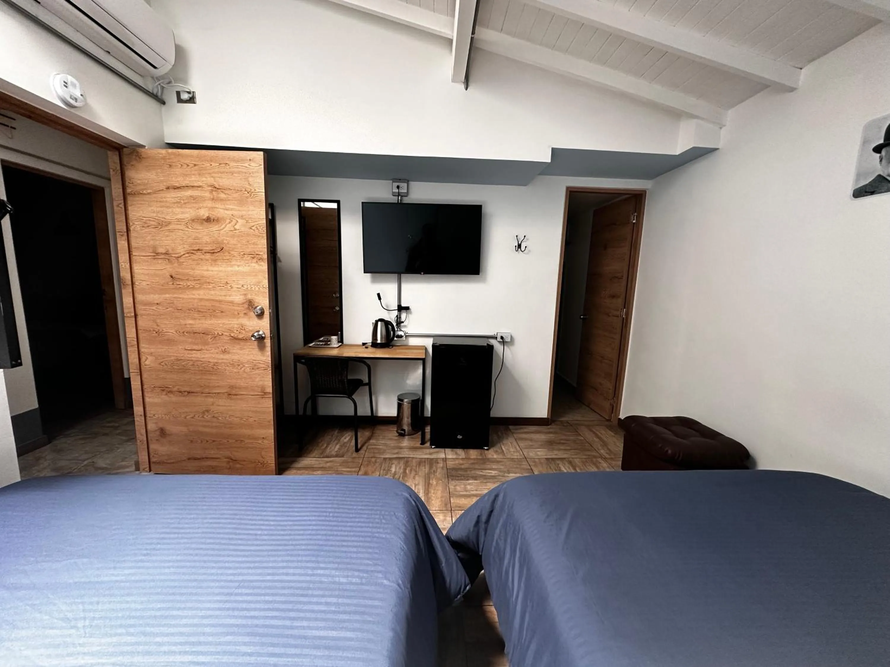 Bed in CoLinkHouse Hotel