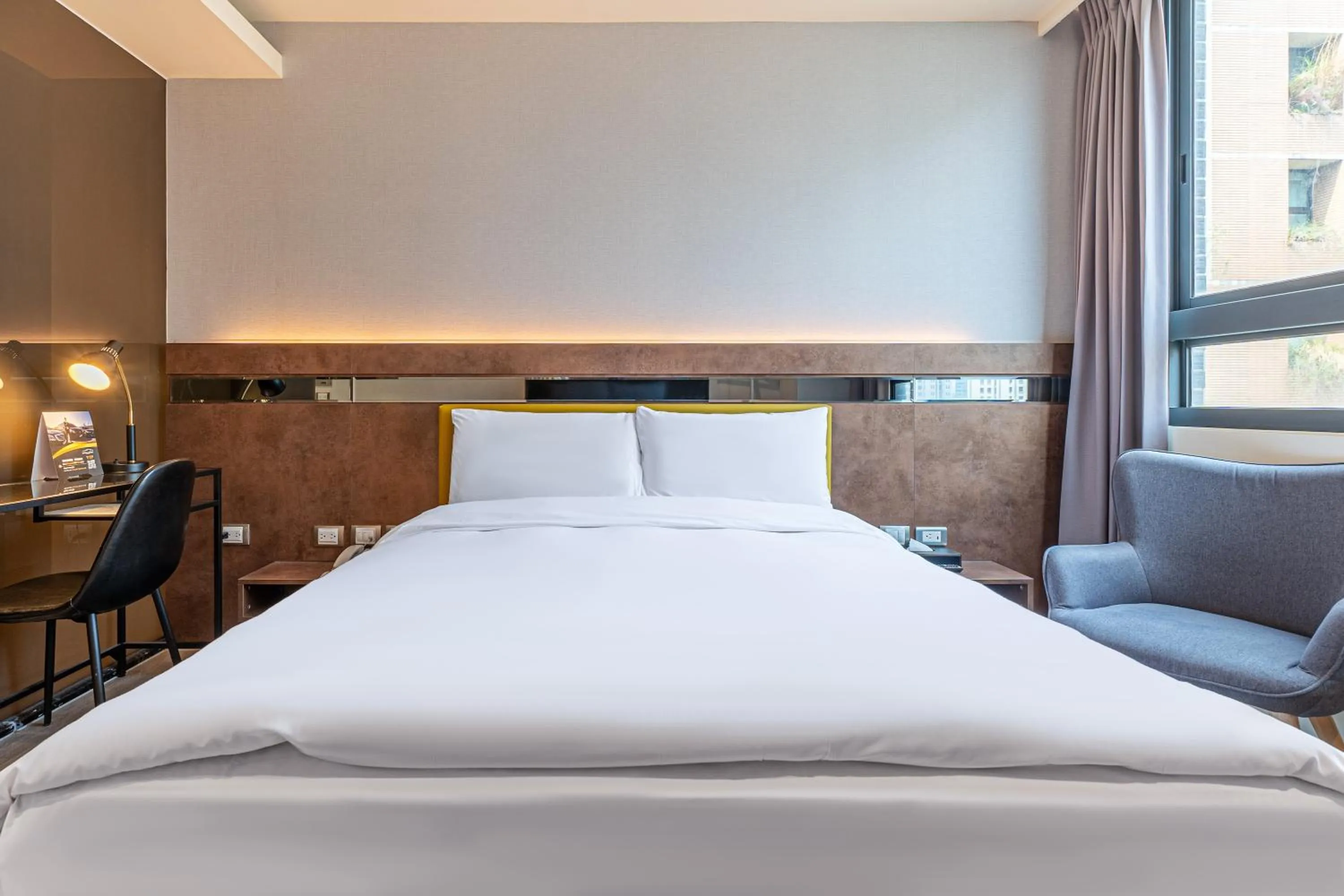 Bed in CHECK inn Taichung Qinghai