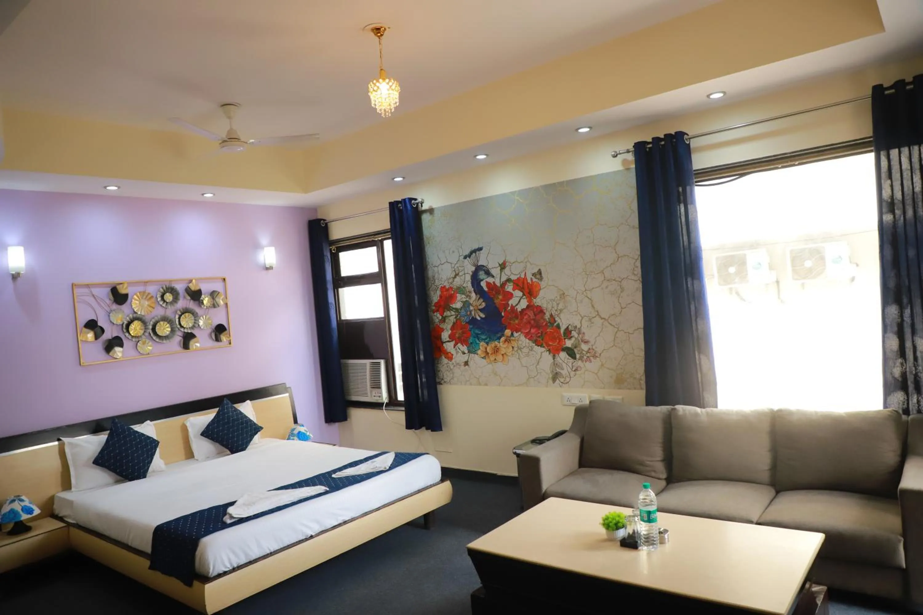 Photo of the whole room, Bed in THE REJOICE VENTURE