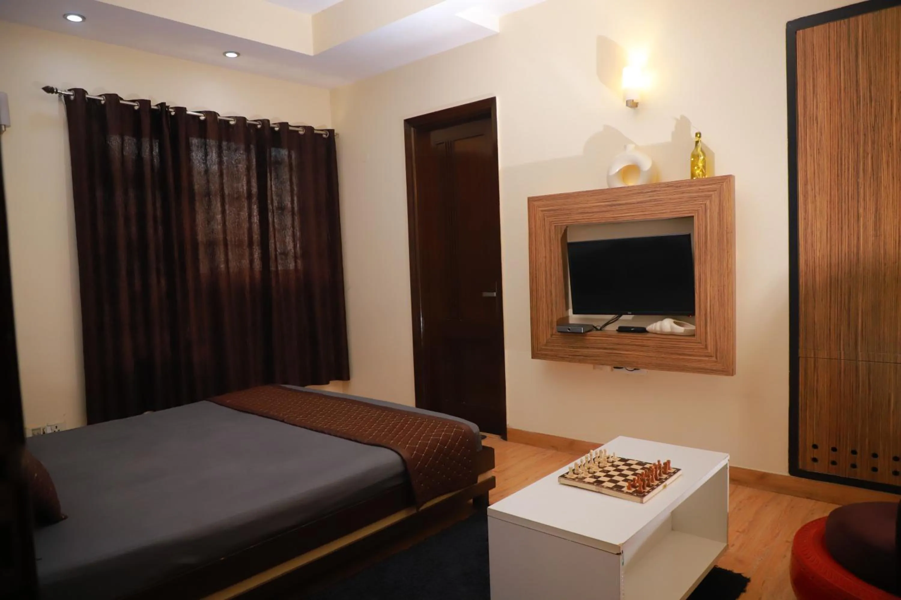 Photo of the whole room, Bed in THE REJOICE VENTURE