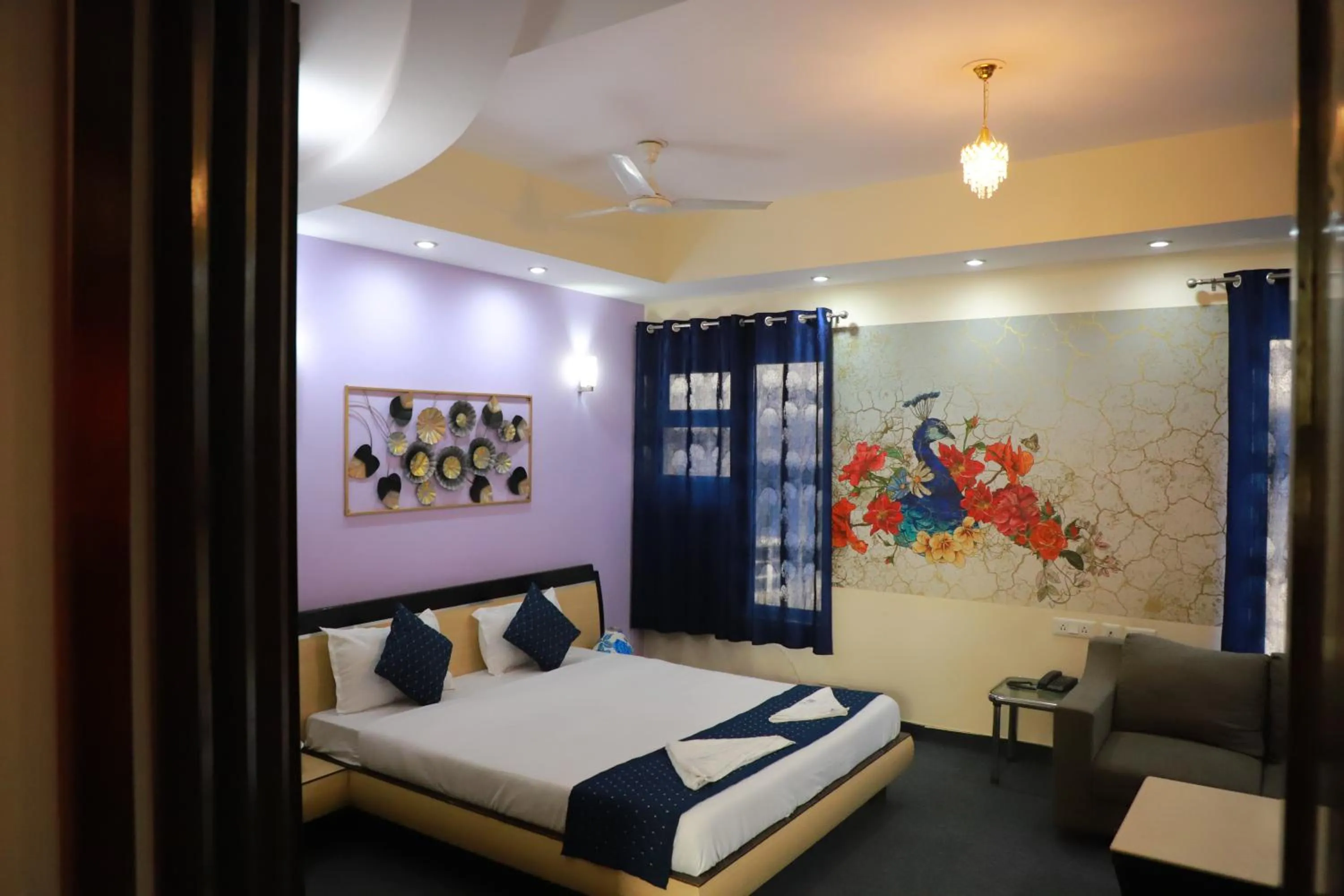 Photo of the whole room, Bed in THE REJOICE VENTURE