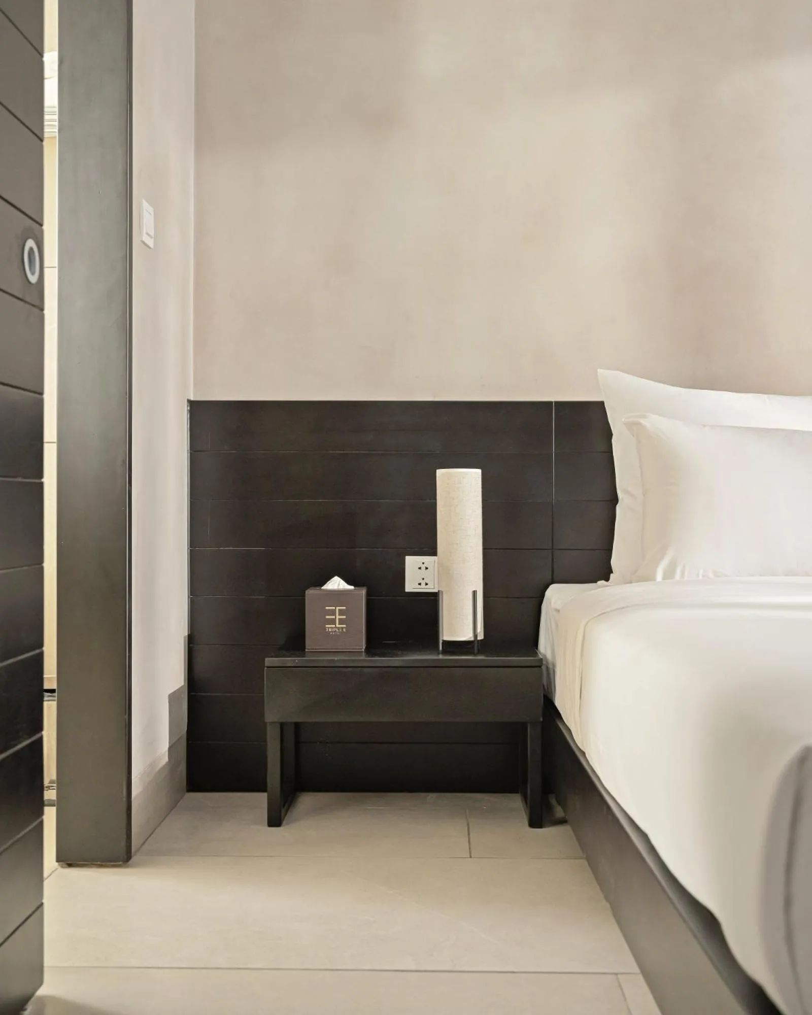 Decorative detail, Bed in Triple E Hotel Metro Ben Thanh