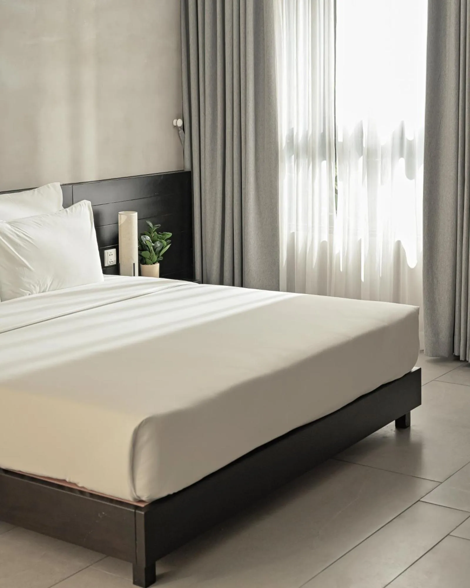 Bed in Triple E Hotel Metro Ben Thanh