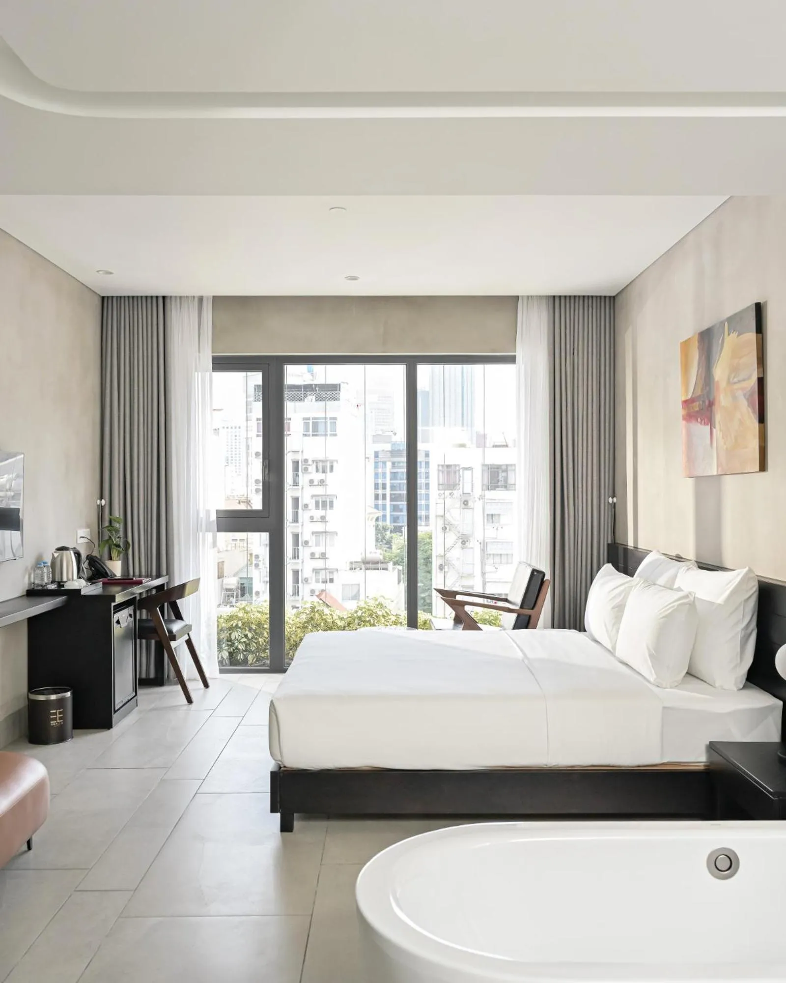 Bed in Triple E Hotel Metro Ben Thanh