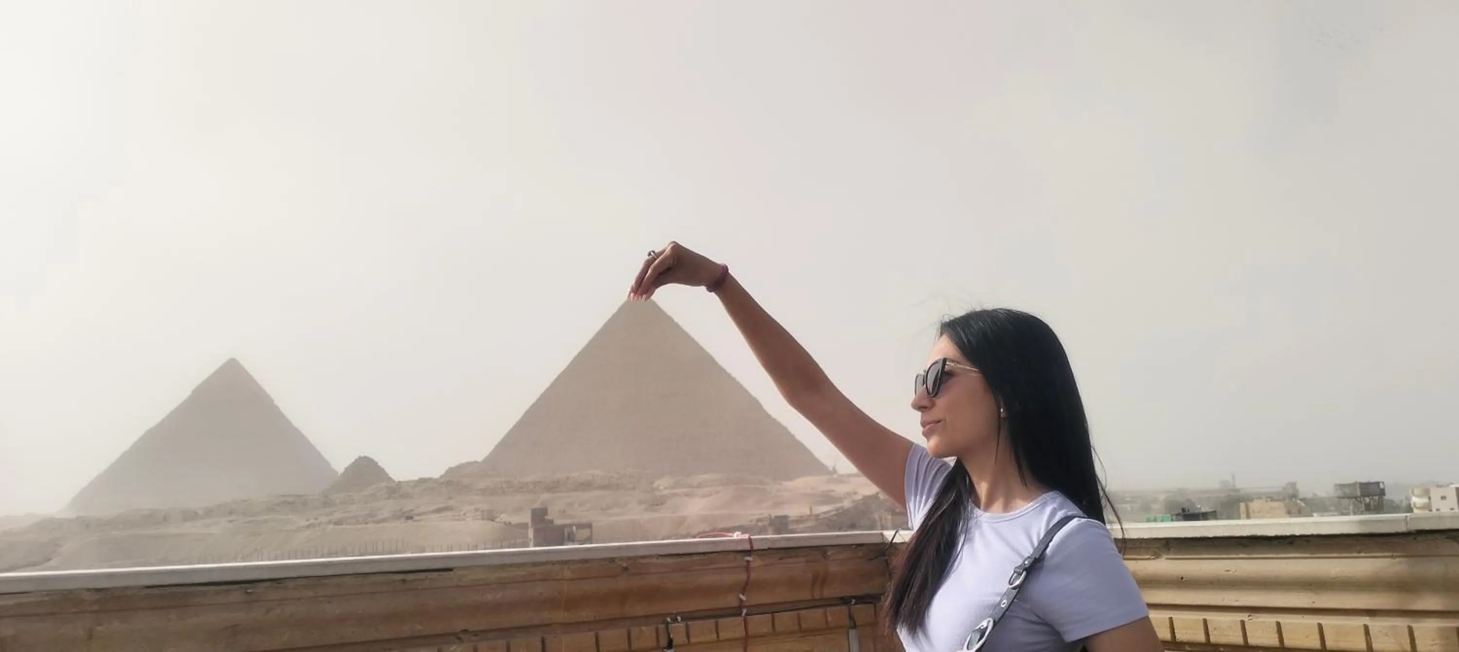 group of guests in Zeina pyramids view