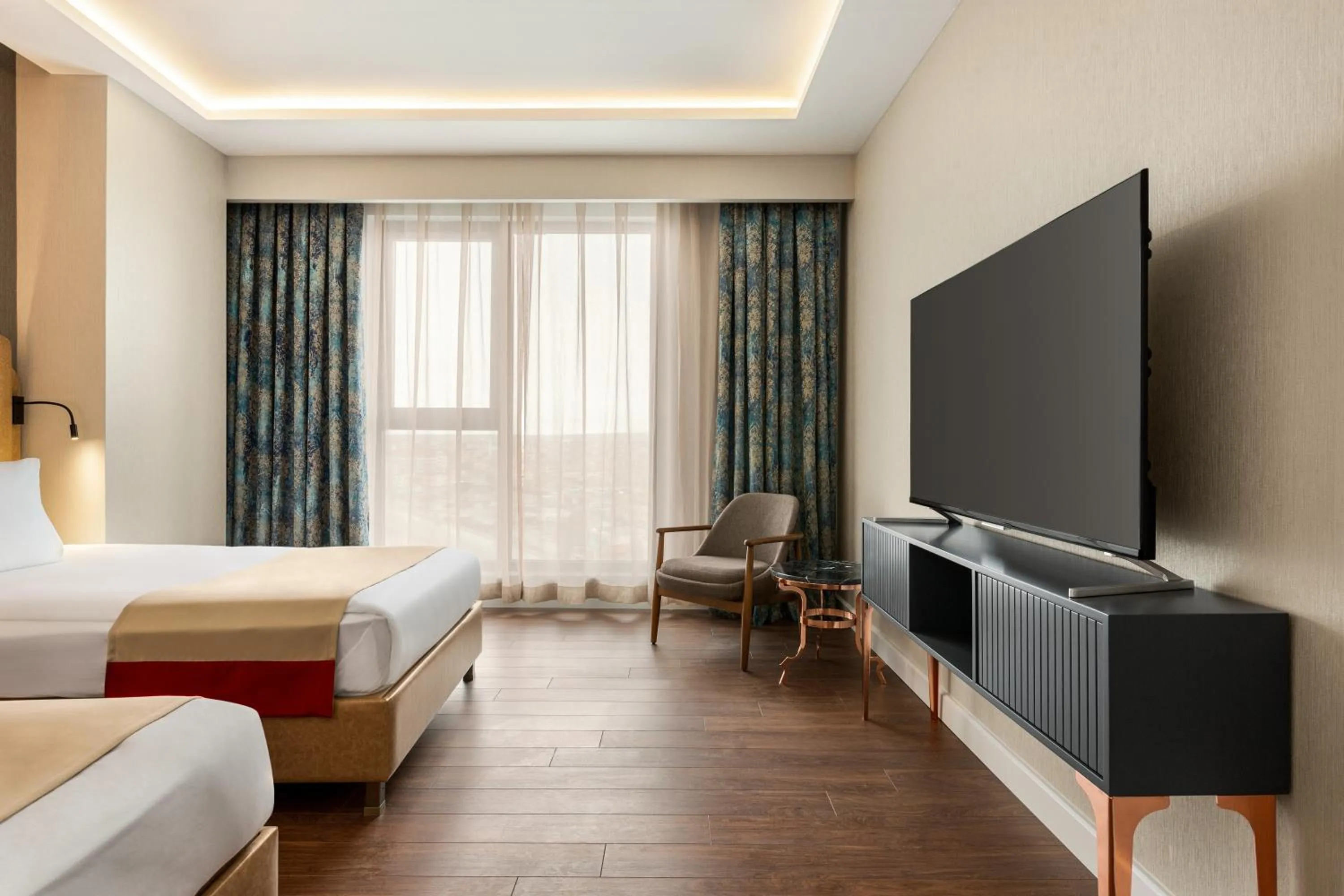 TV and multimedia, Bed in Ramada by Wyndham Karapinar