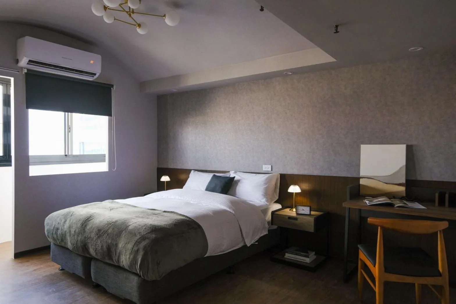 Seating area, Bed in Giant Rich Hotel