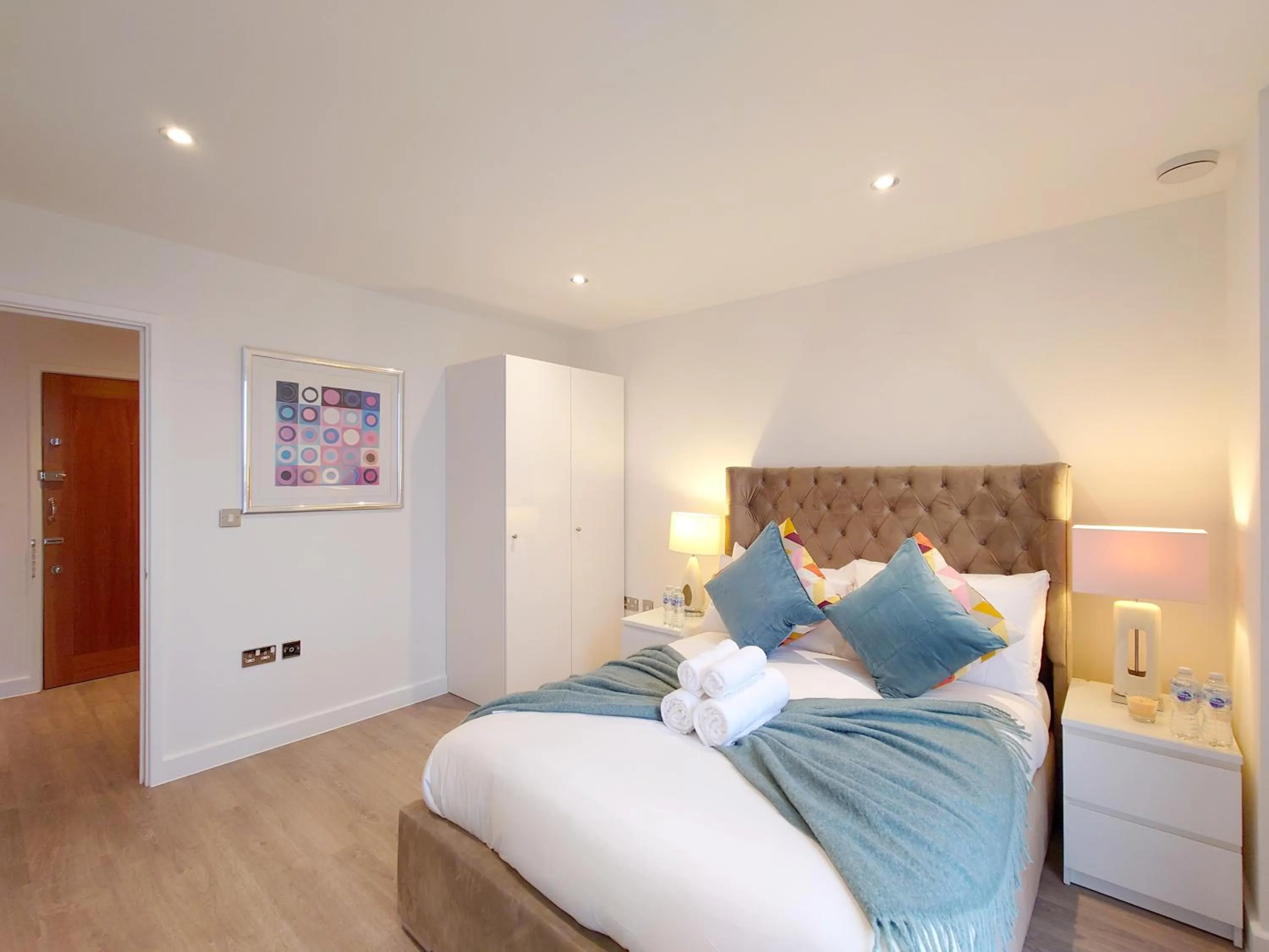 Bed in Deluxe Two Bed Apartment with River & City View