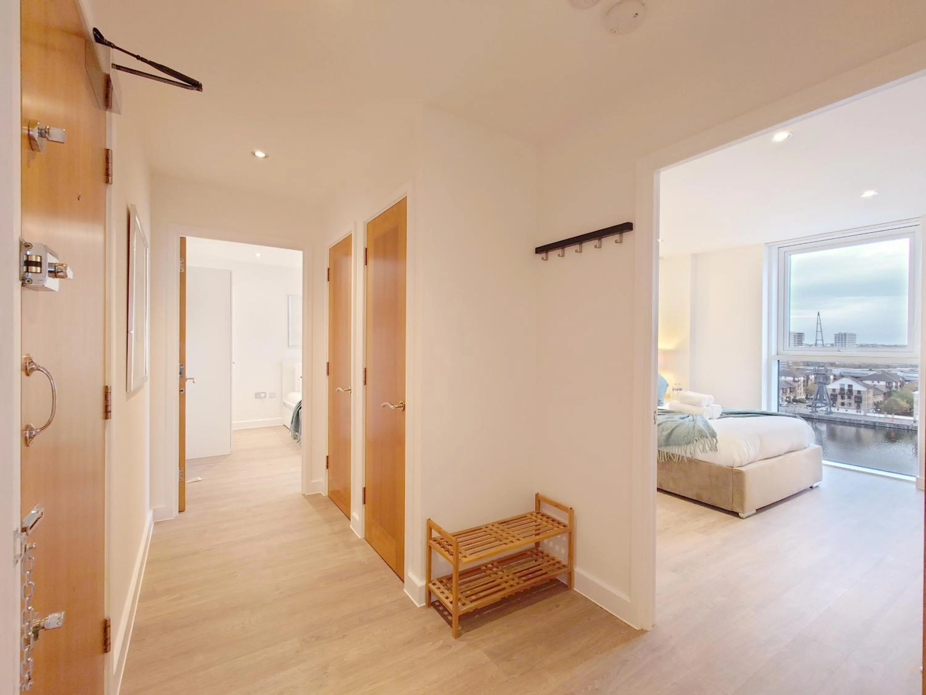 Bed in Deluxe Two Bed Apartment with River & City View