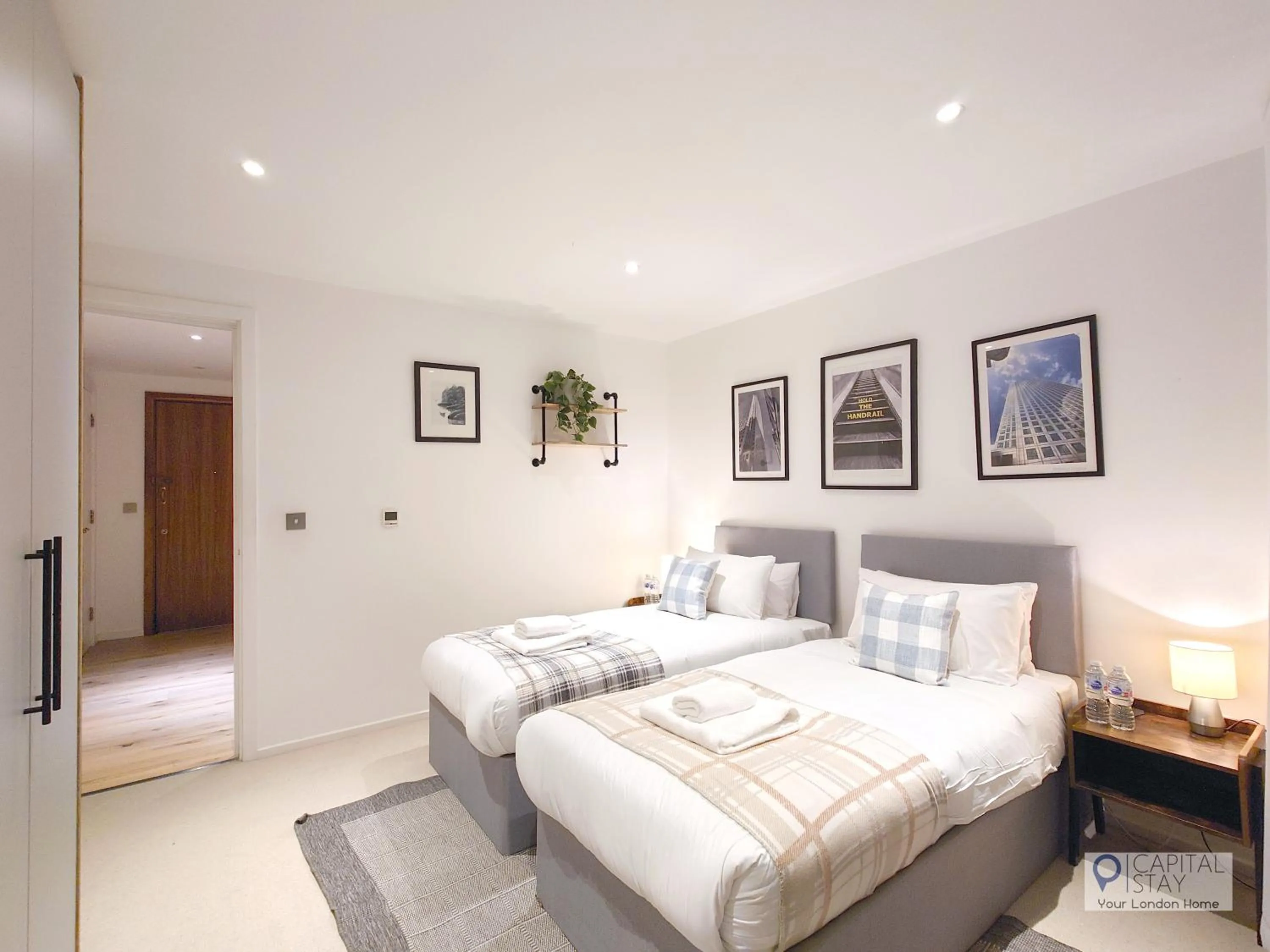 Bedroom, Bed in Deluxe Two Bed Apartment with River & City View