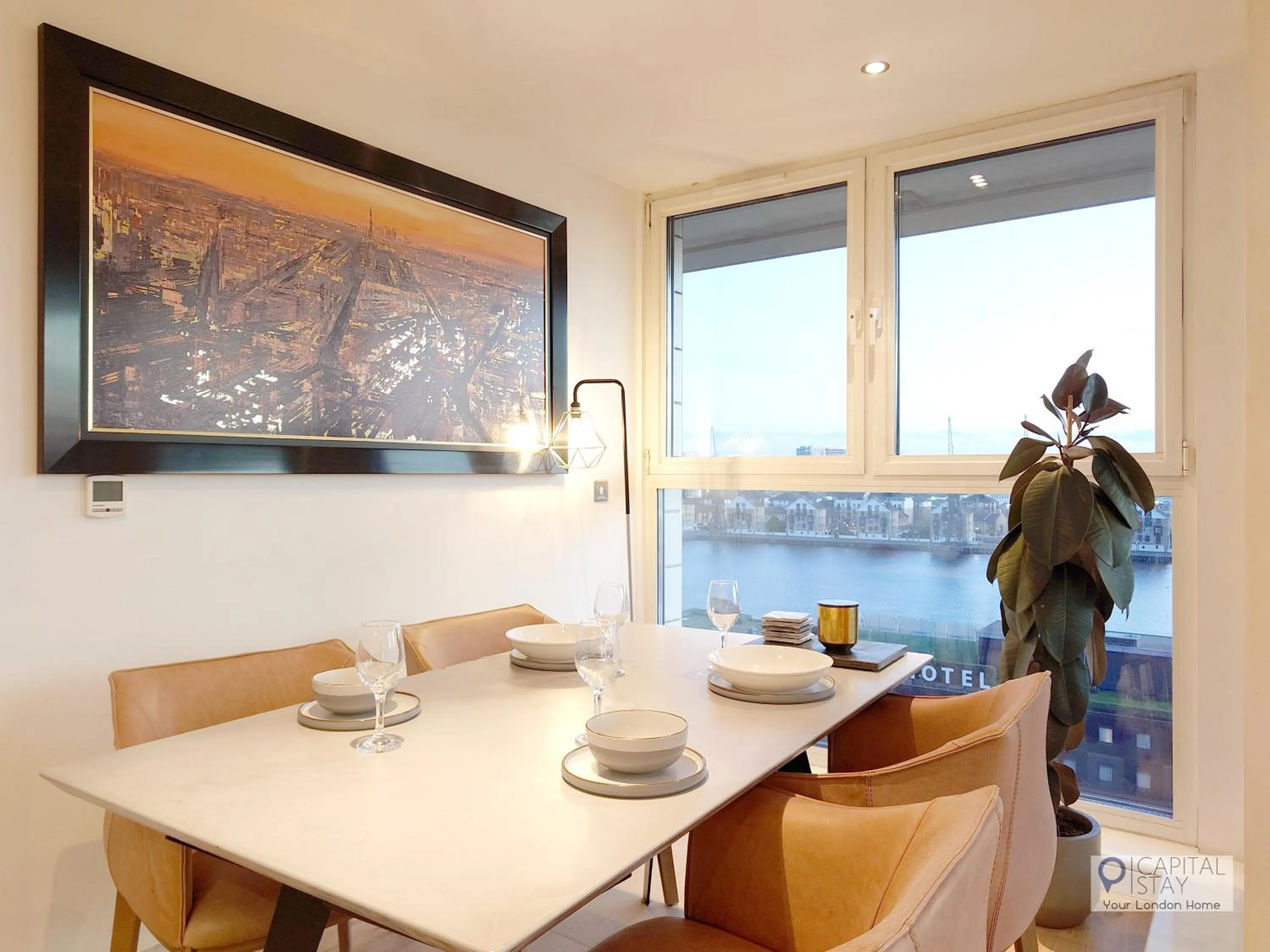 Dining area in Deluxe Two Bed Apartment with River & City View