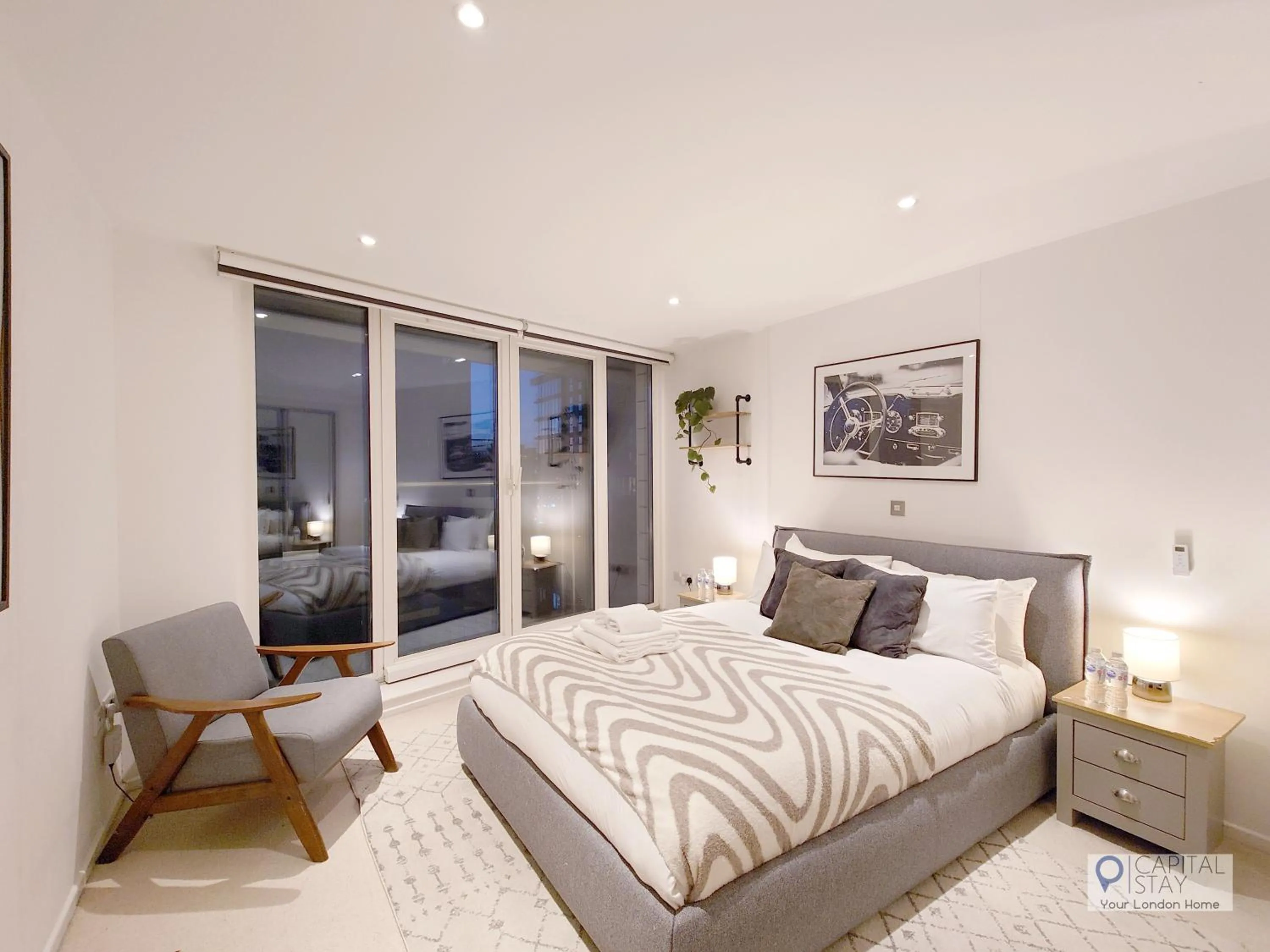 Bed in Deluxe Two Bed Apartment with River & City View