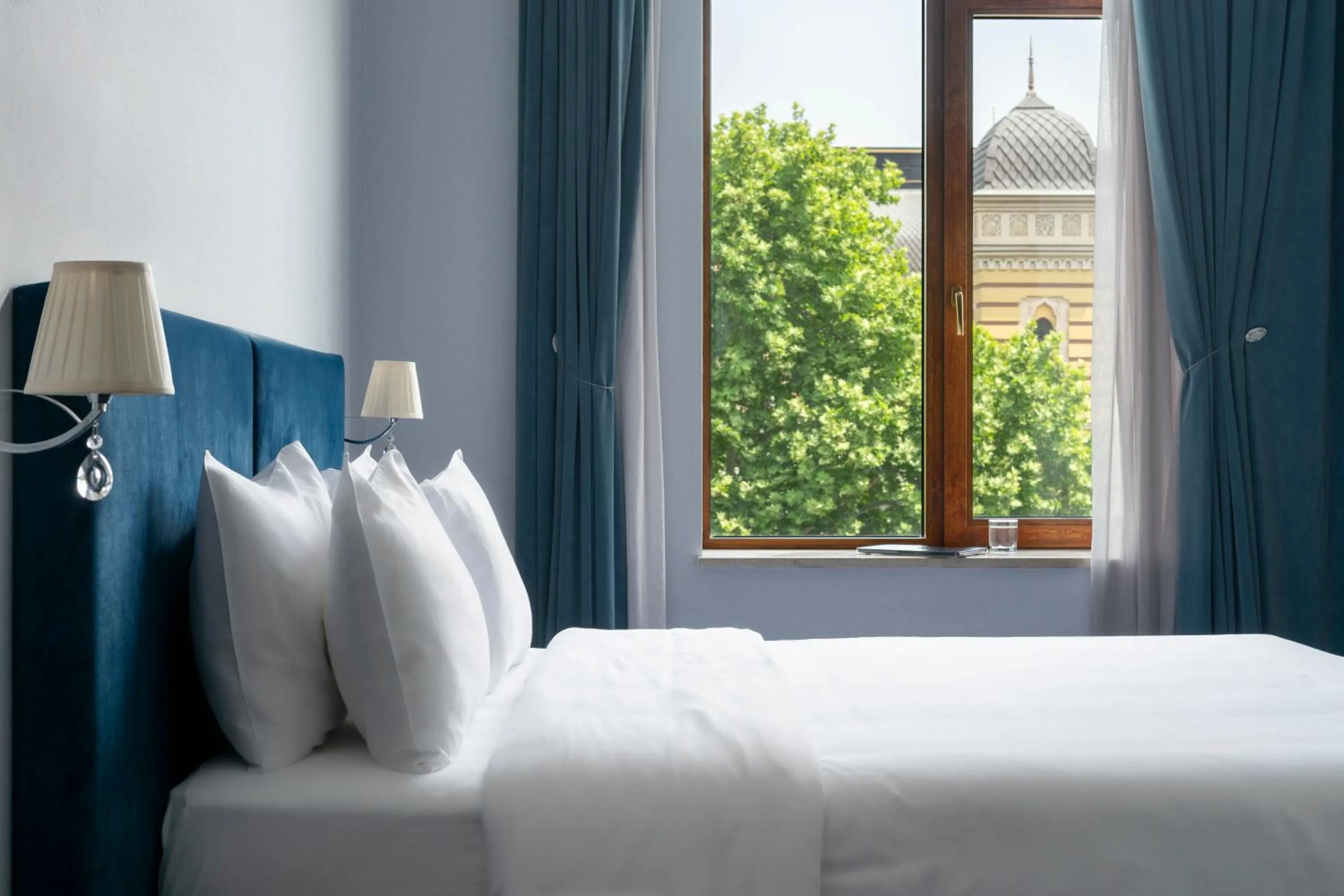 View (from property/room), Bed in Alma Boutique Hotel