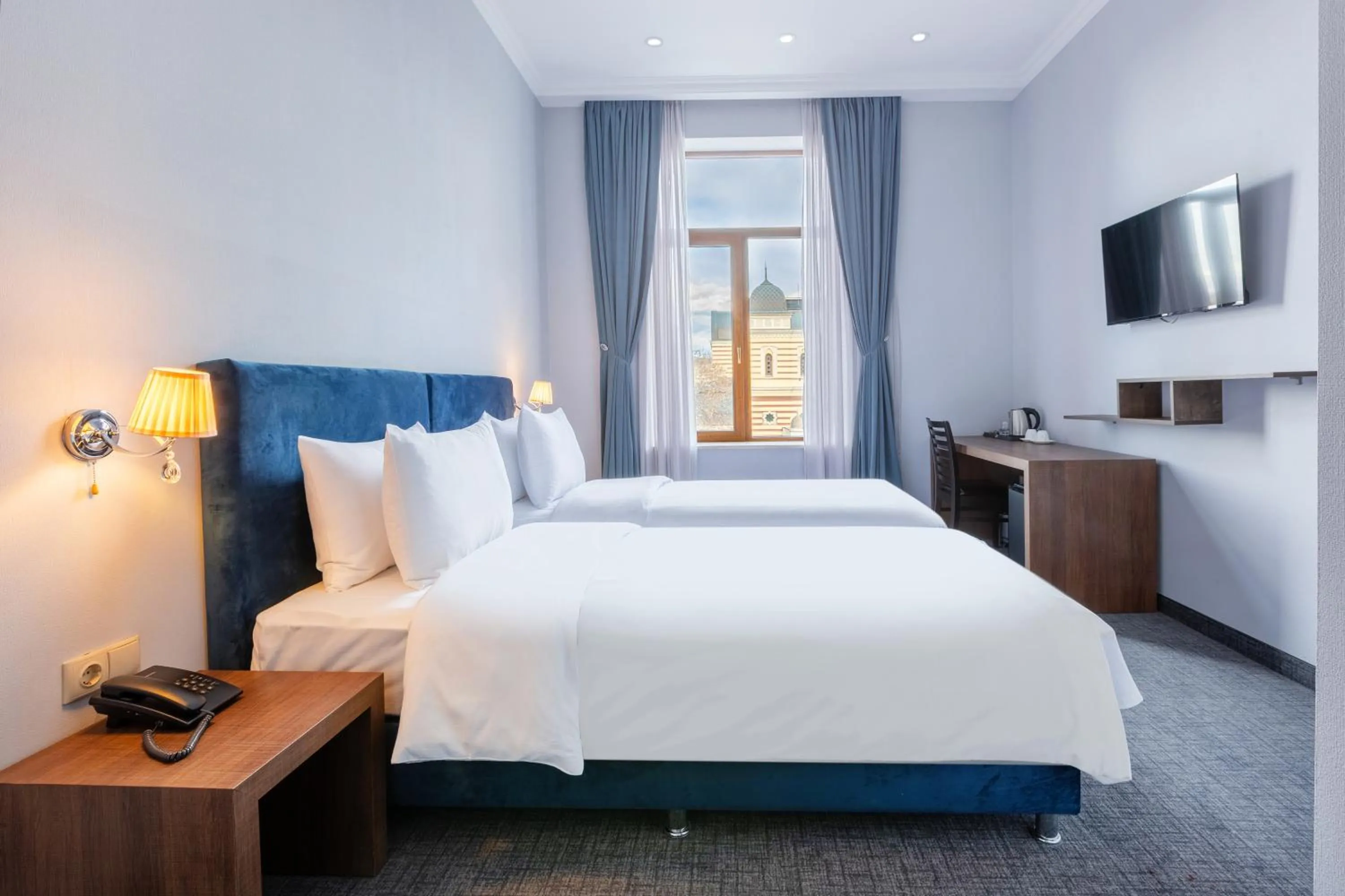 Bed in Alma Boutique Hotel