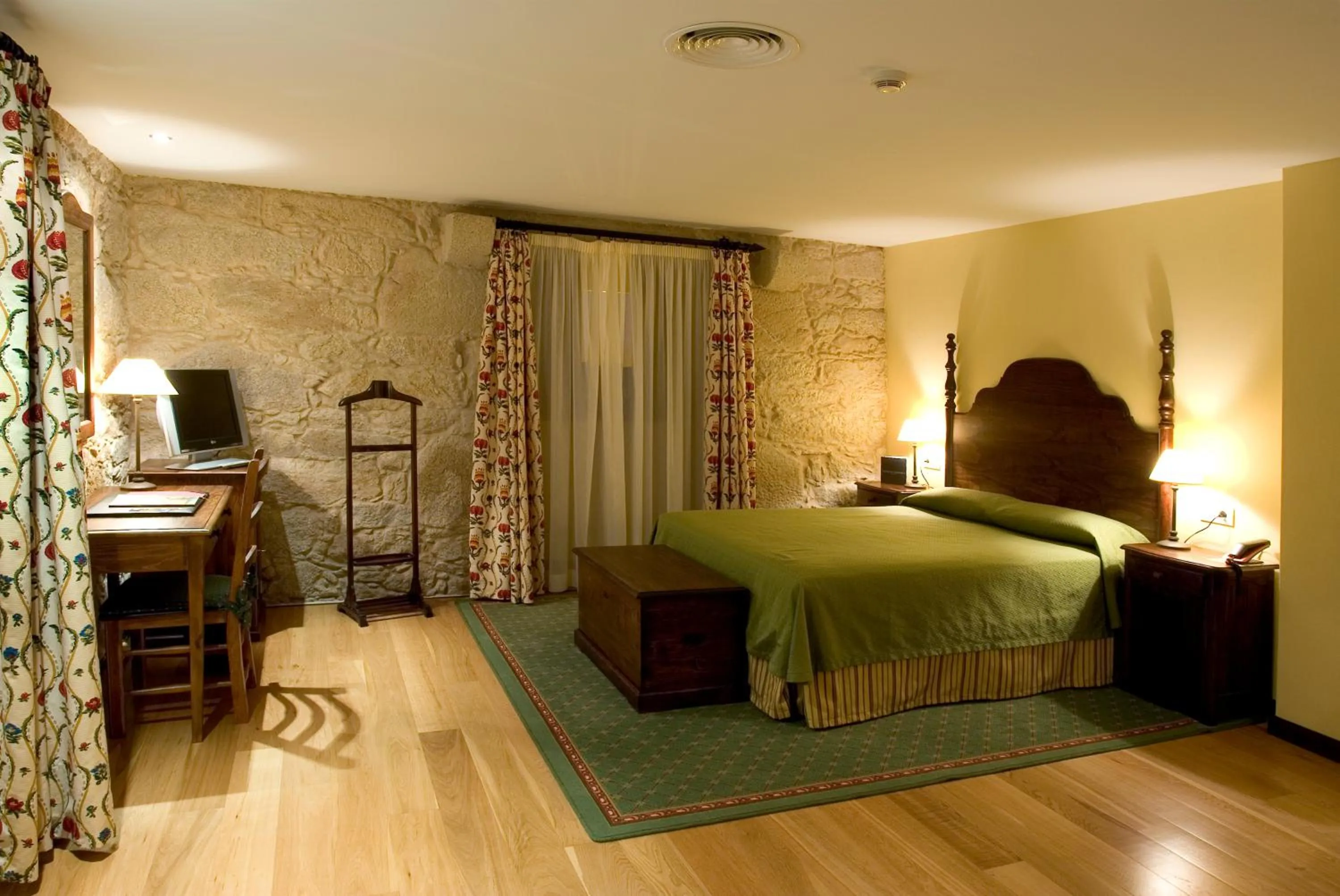 Photo of the whole room, Bed in Hotel Pazo de Lestrove by Pousadas de Compostela