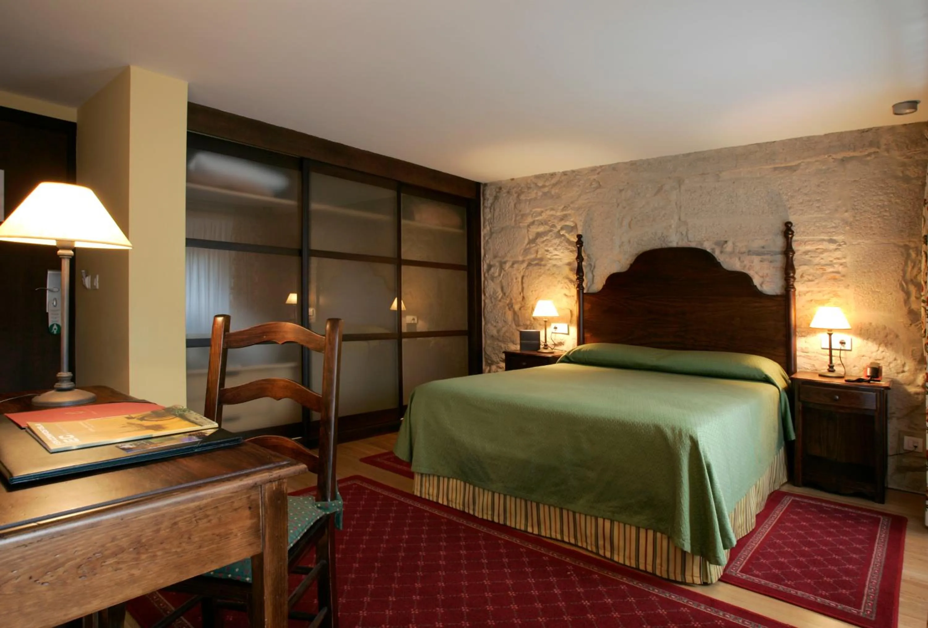 Bed in Hotel Pazo de Lestrove by Pousadas de Compostela
