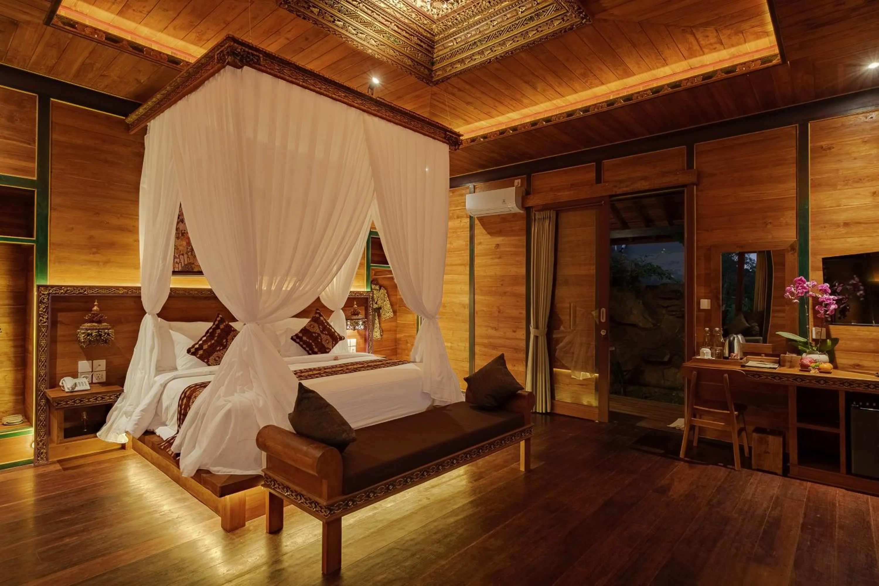 Bed in Gynandha Ubud Cottage