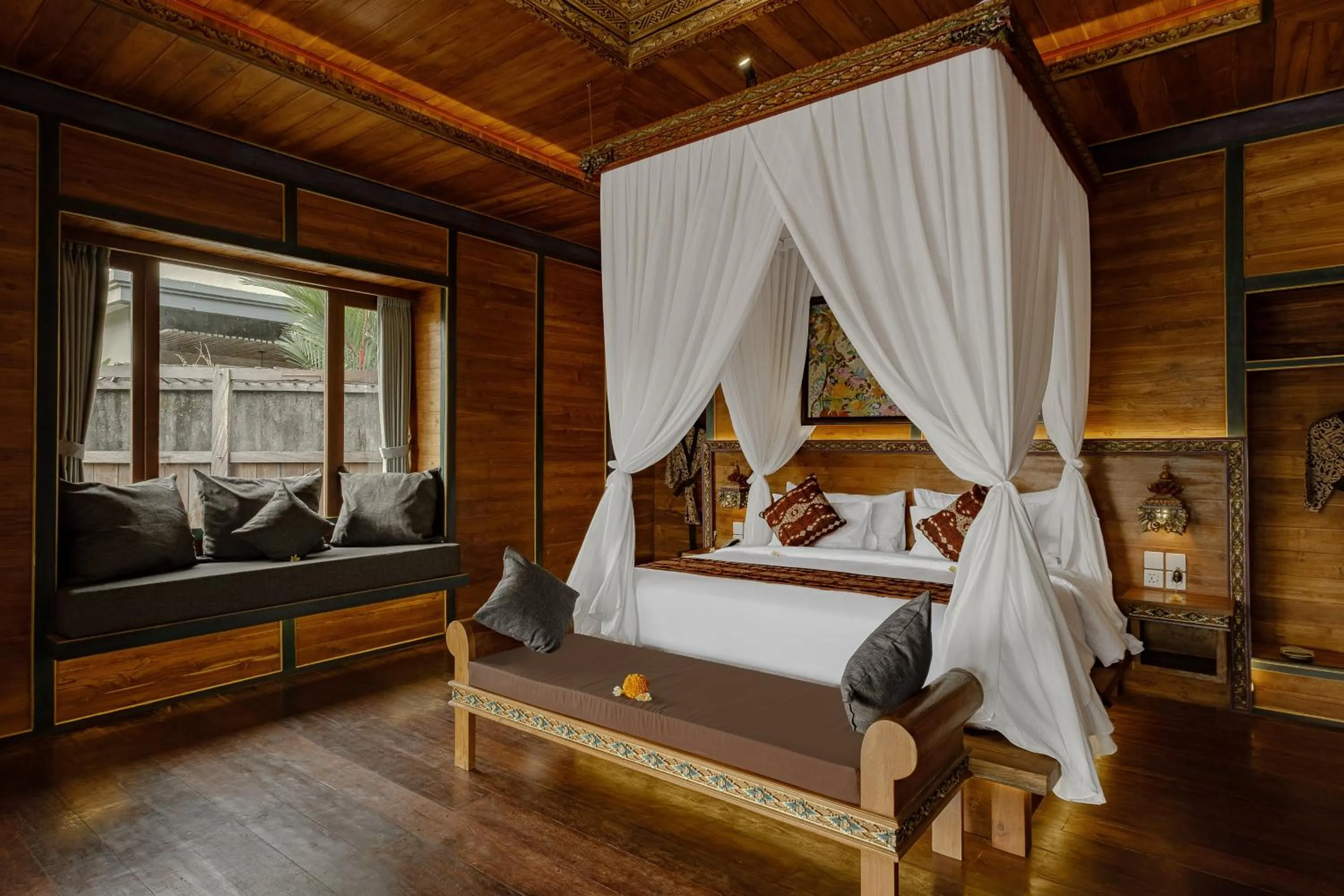 Bed in Gynandha Ubud Cottage