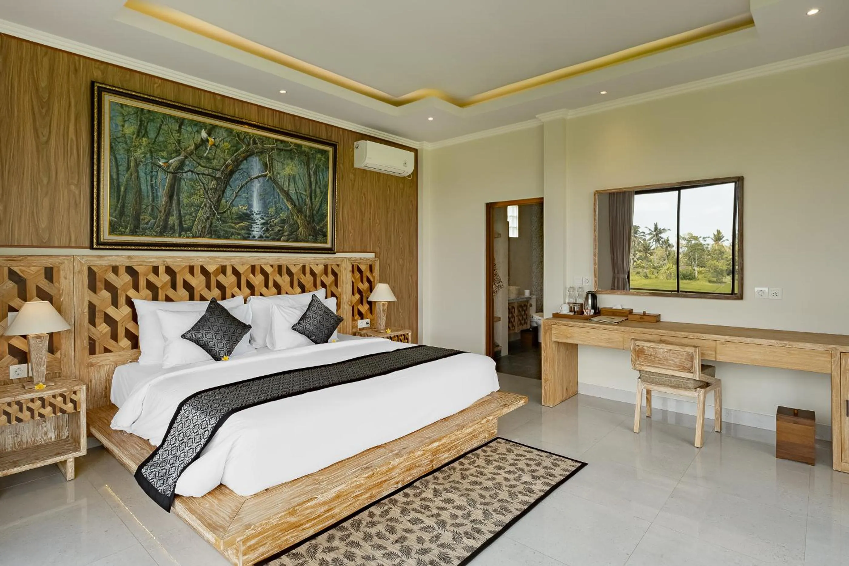 Bed in Gynandha Ubud Cottage