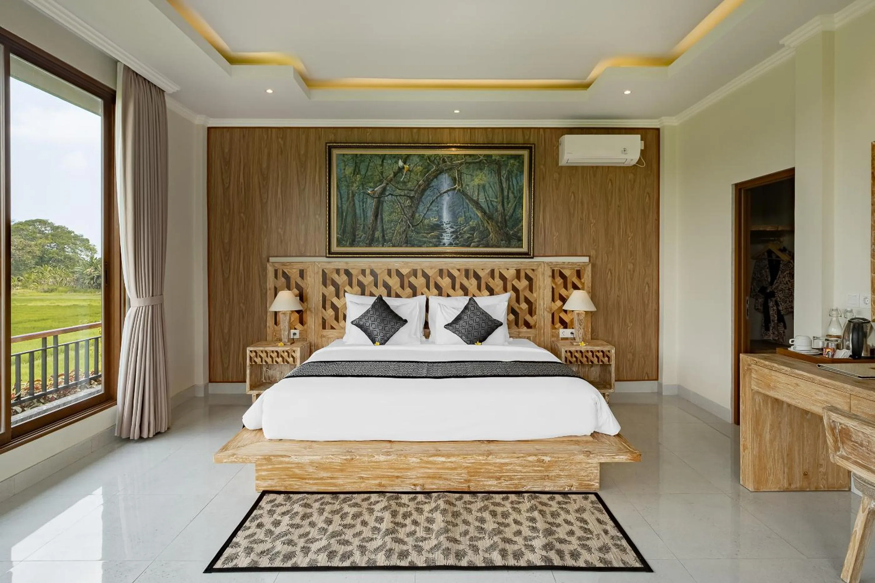 Bed in Gynandha Ubud Cottage