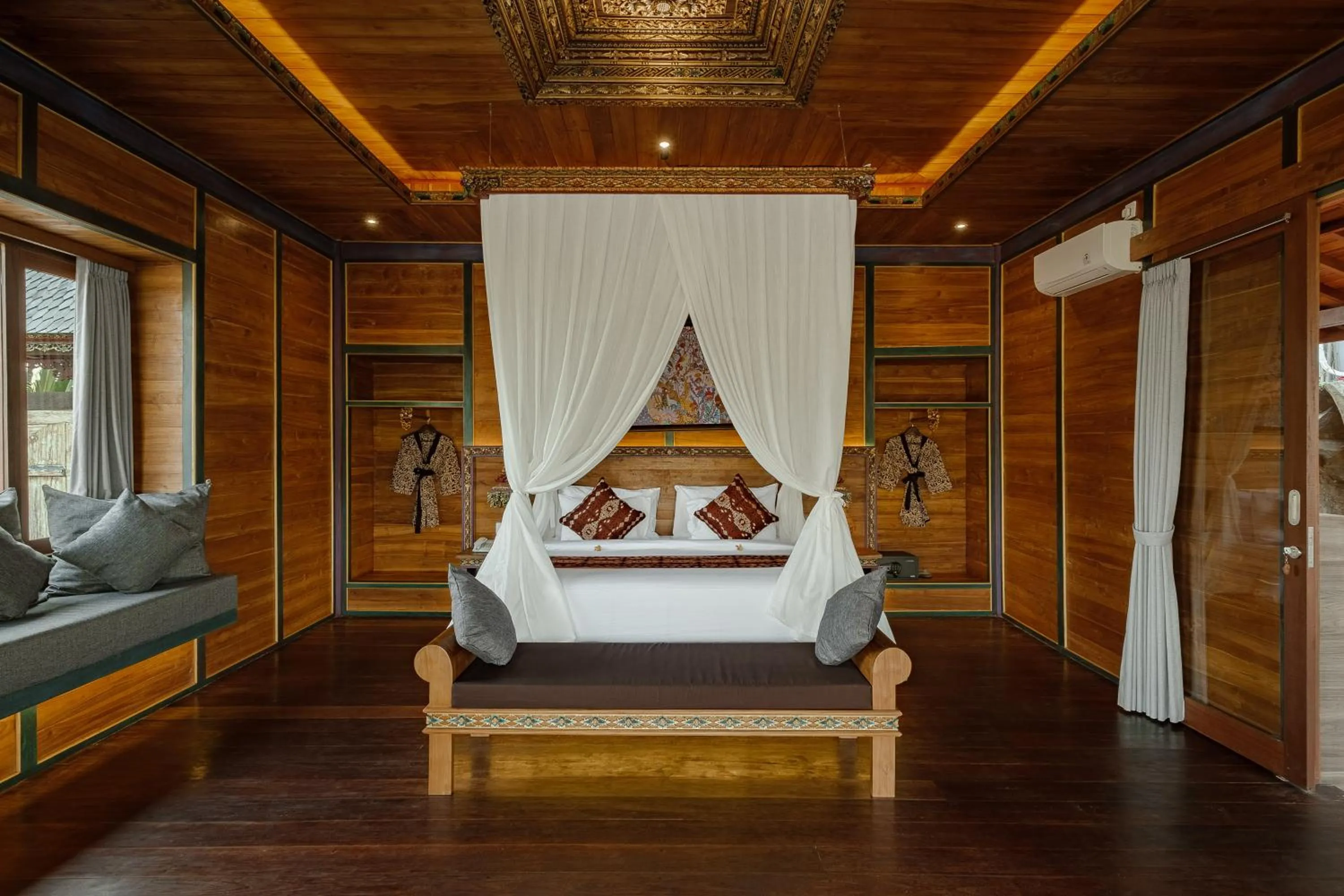 Bed in Gynandha Ubud Cottage