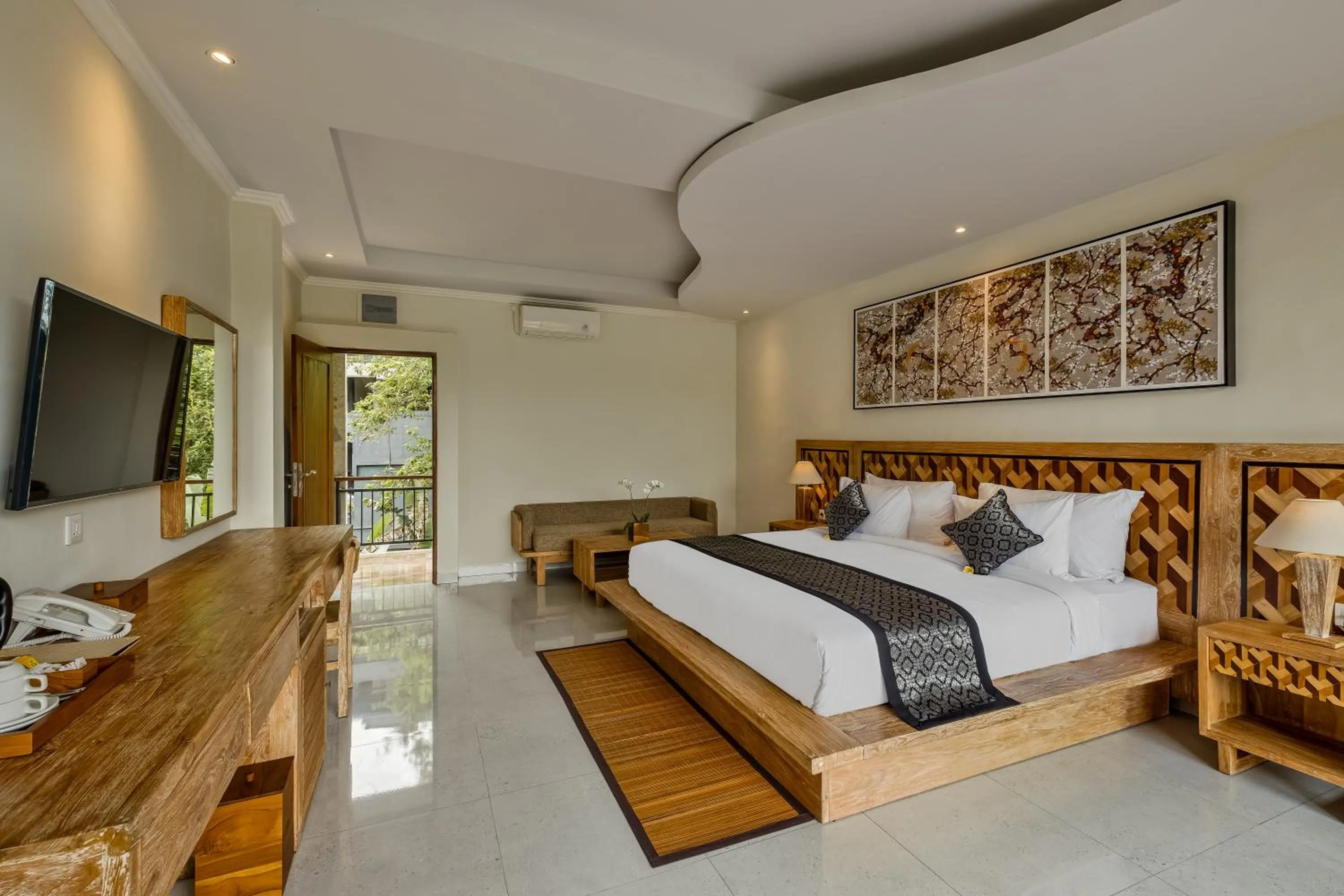 Bed in Gynandha Ubud Cottage